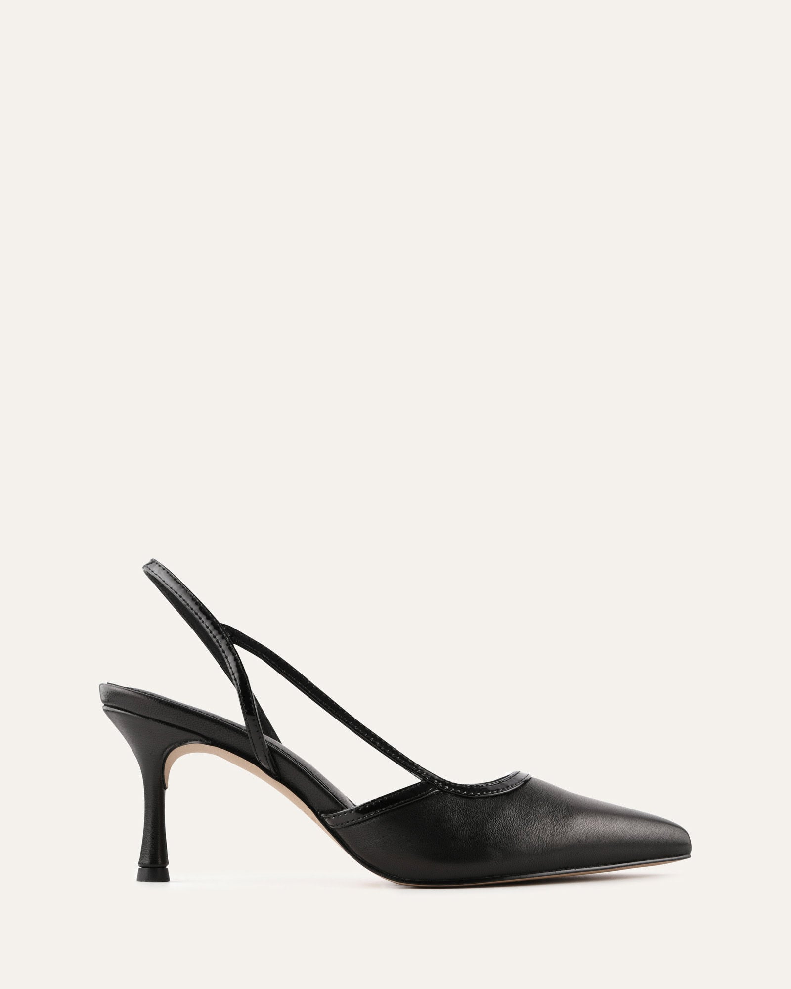 Black slingback shoe on a light gray background