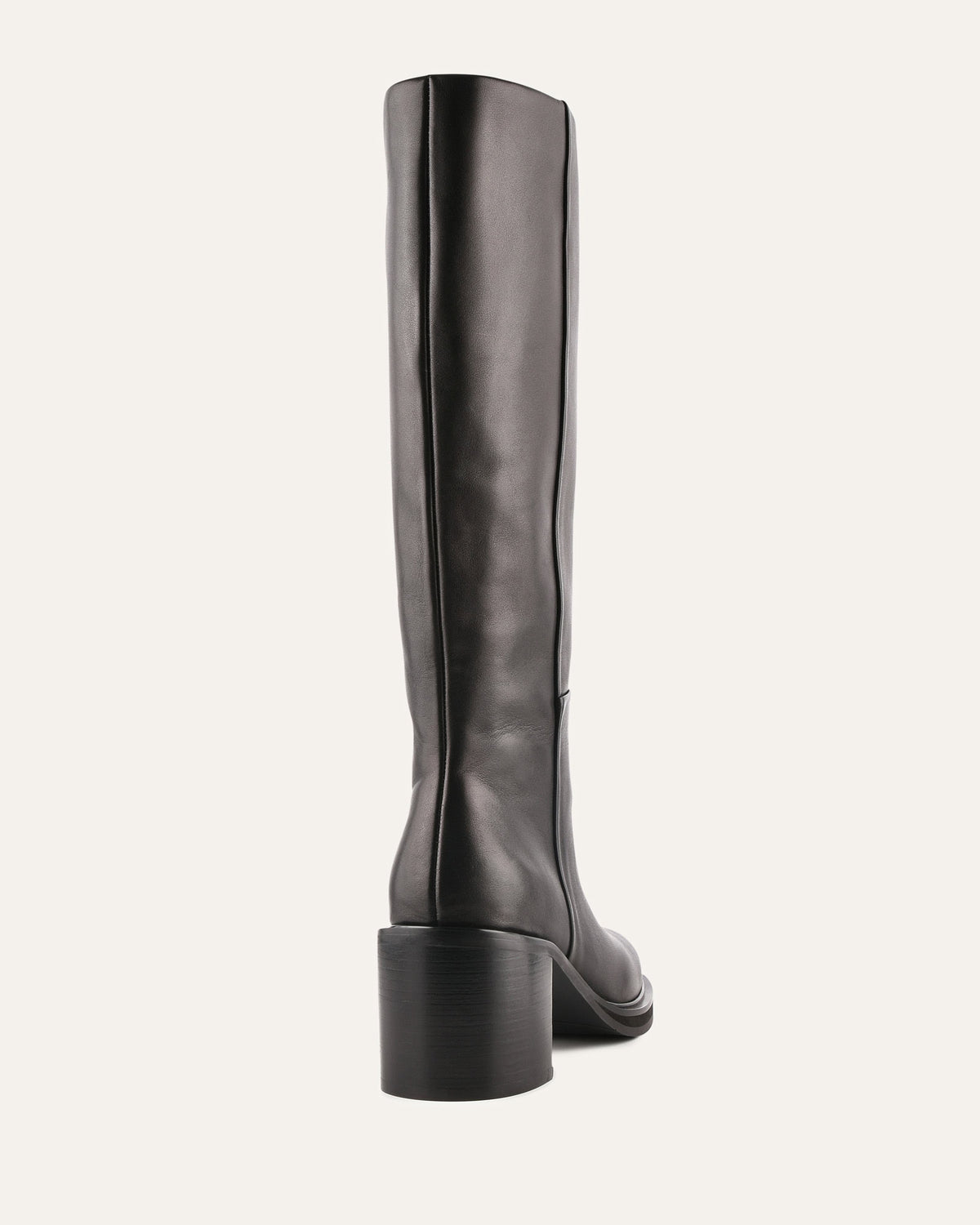 Black knee-high boot on a white background