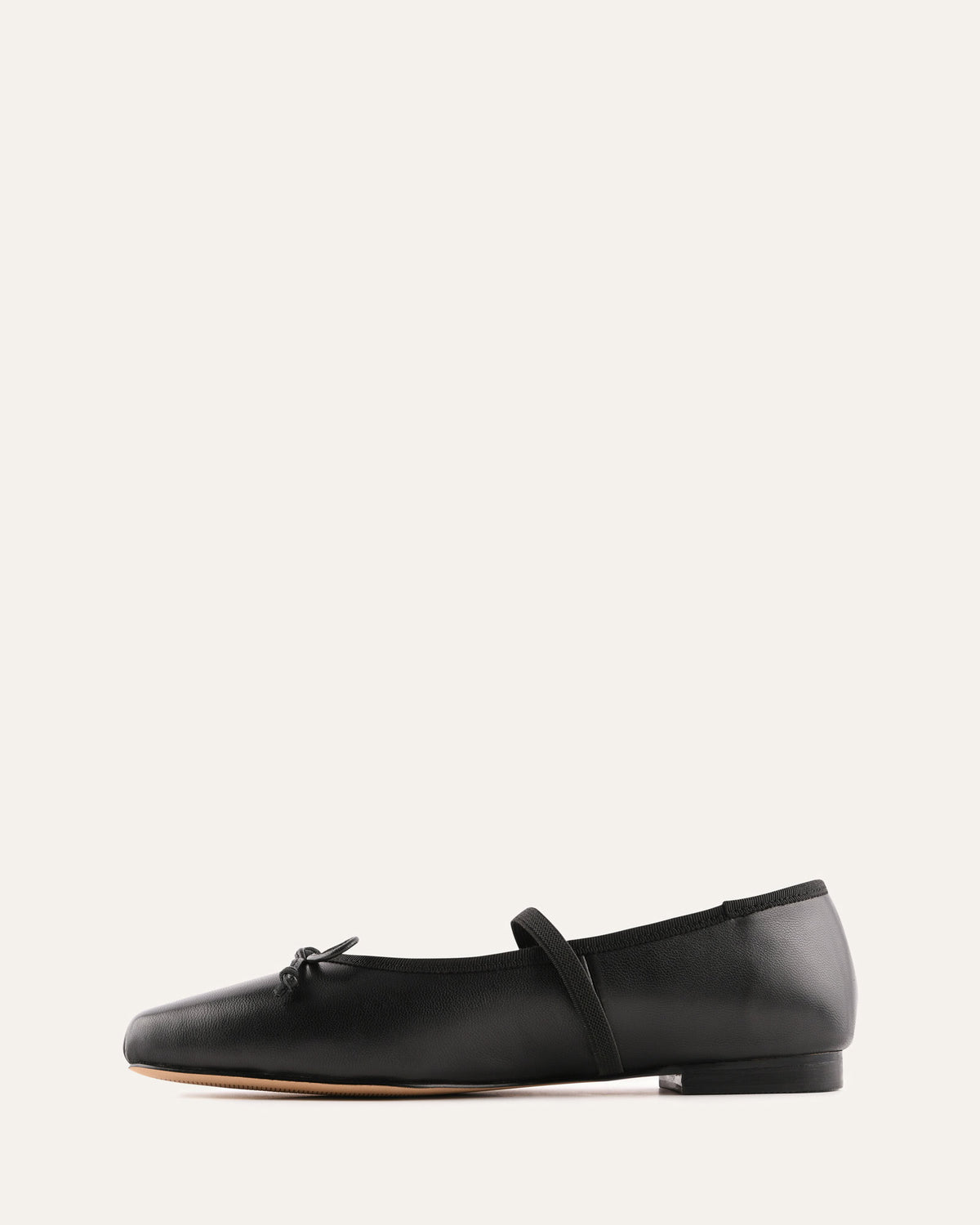 Black flat shoe on a white background