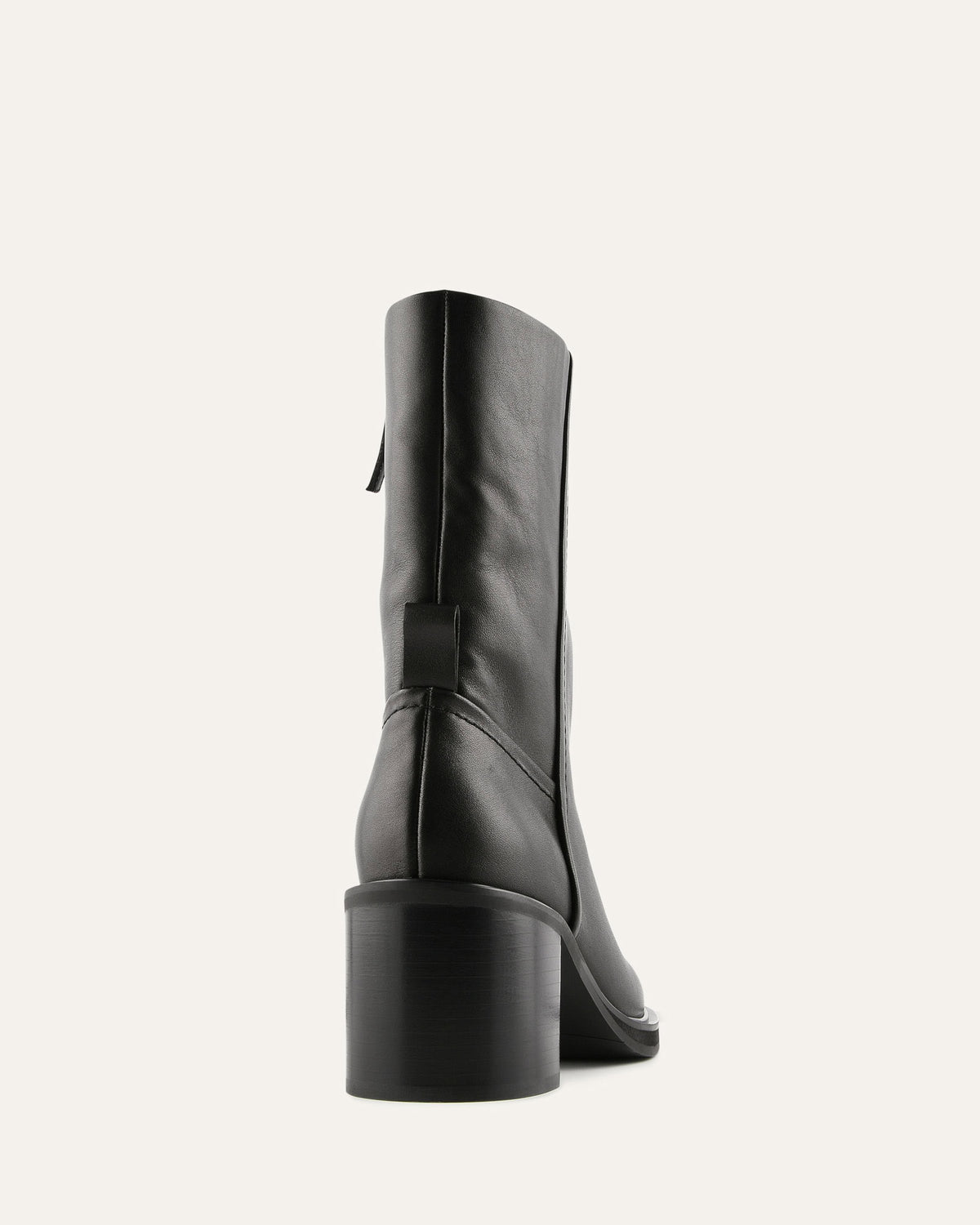 Black knee-high boot on a white background