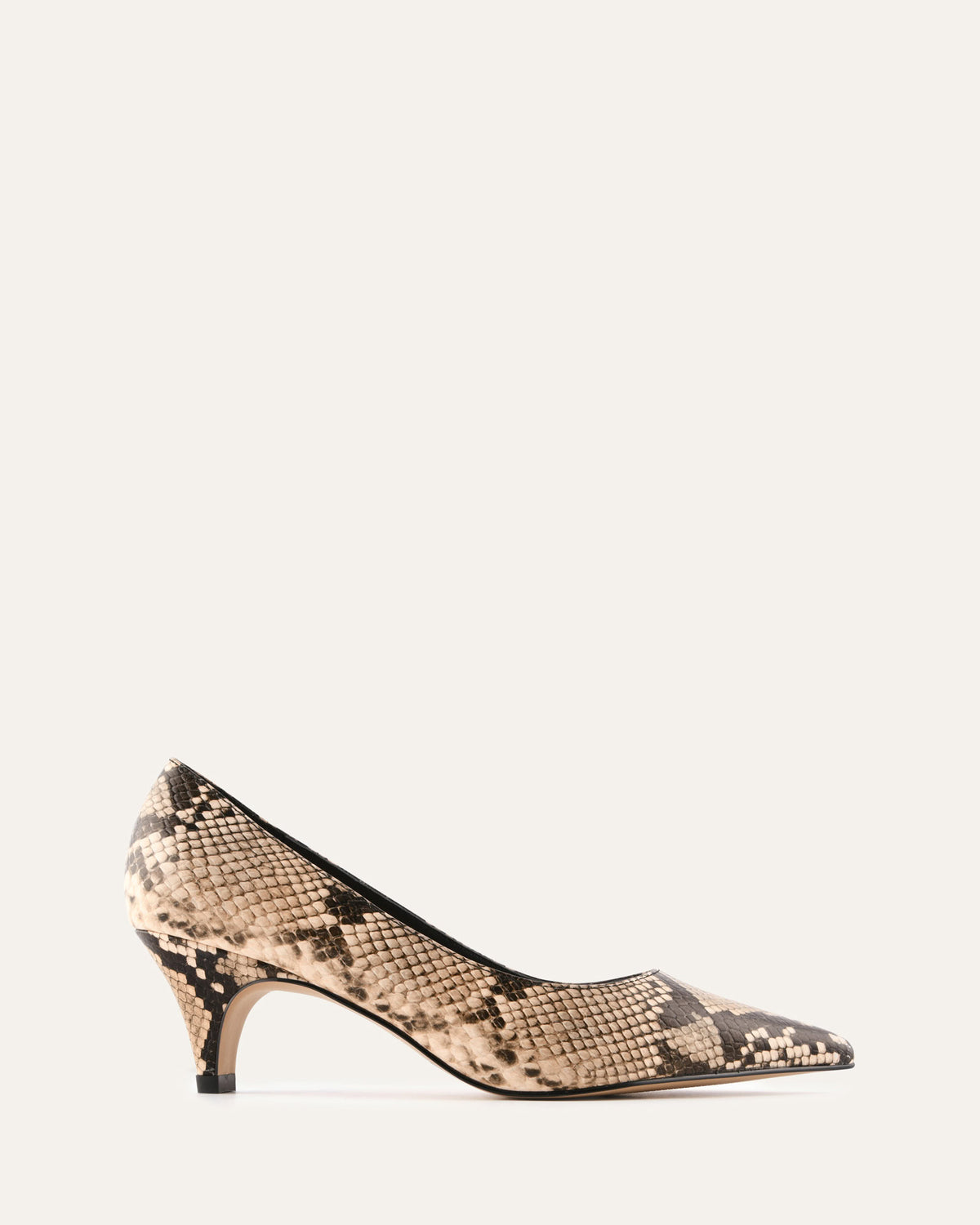 Snake print high heel shoe on a white background