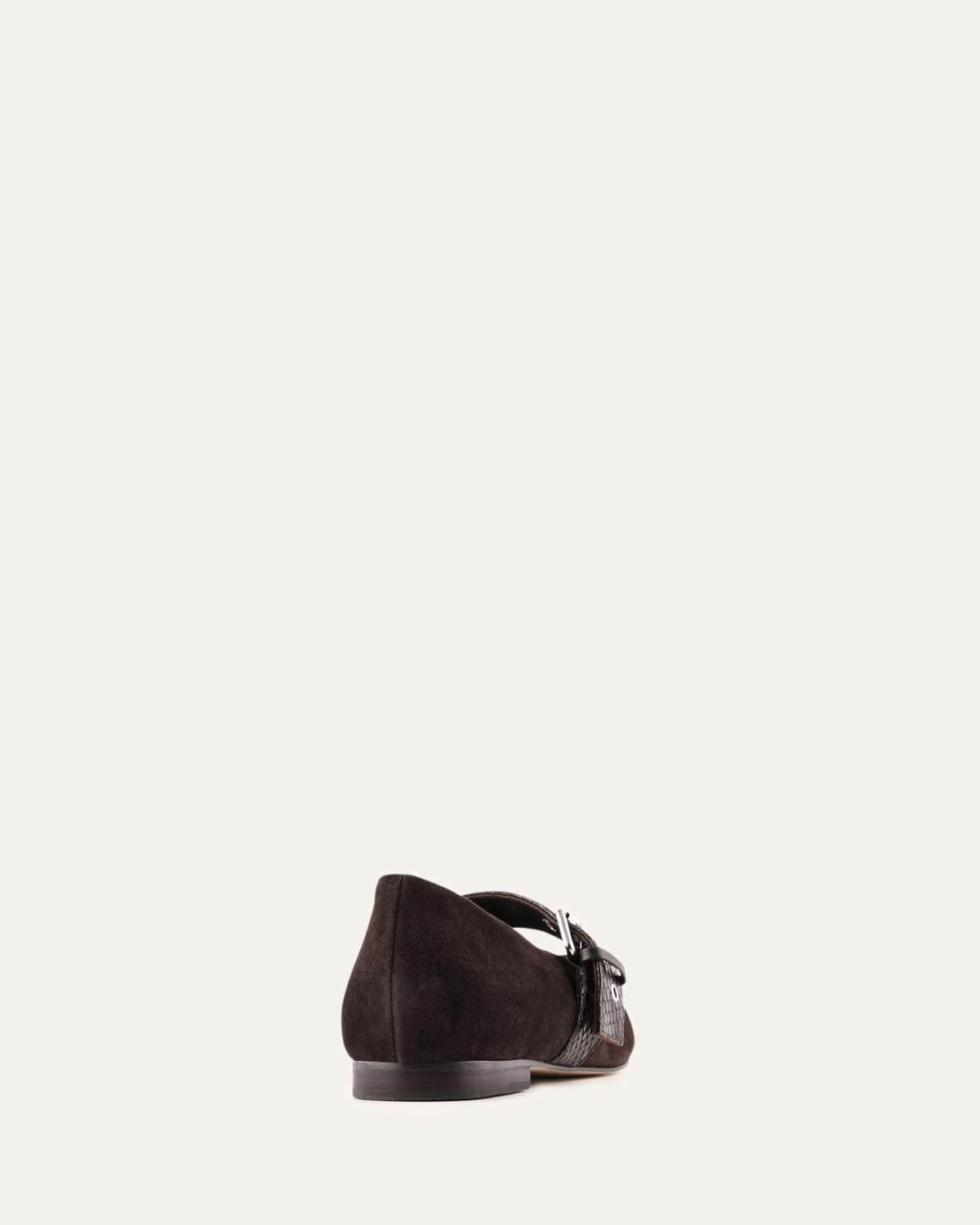 Brown suede shoe on a white background