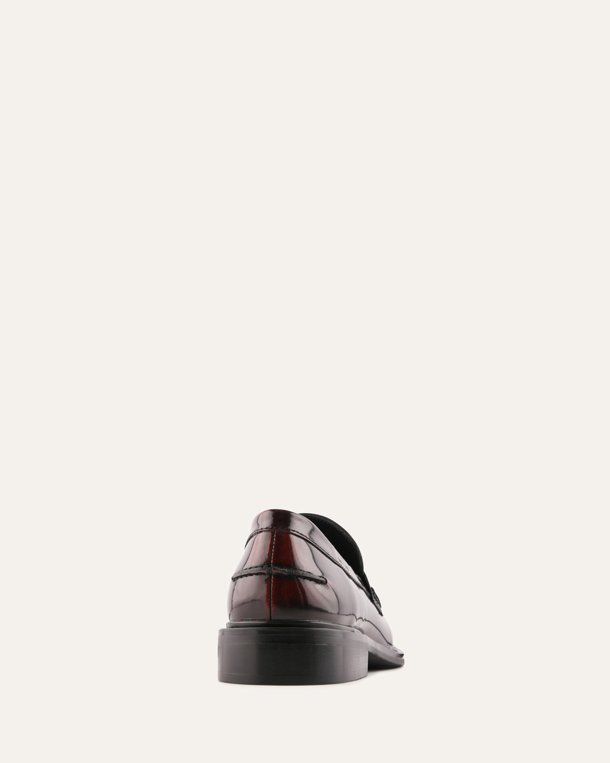 Brown leather shoe on a white background