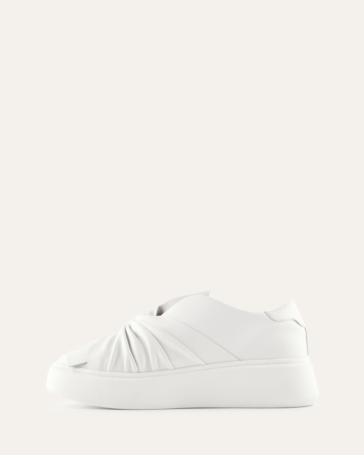 White sneaker on a light gray background