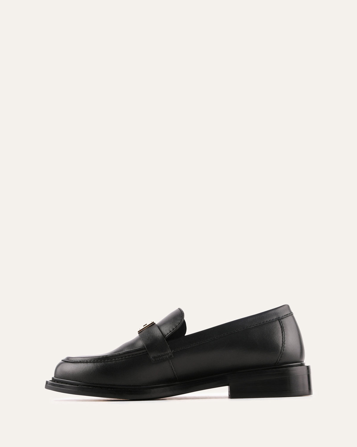 Black loafer shoe on a white background