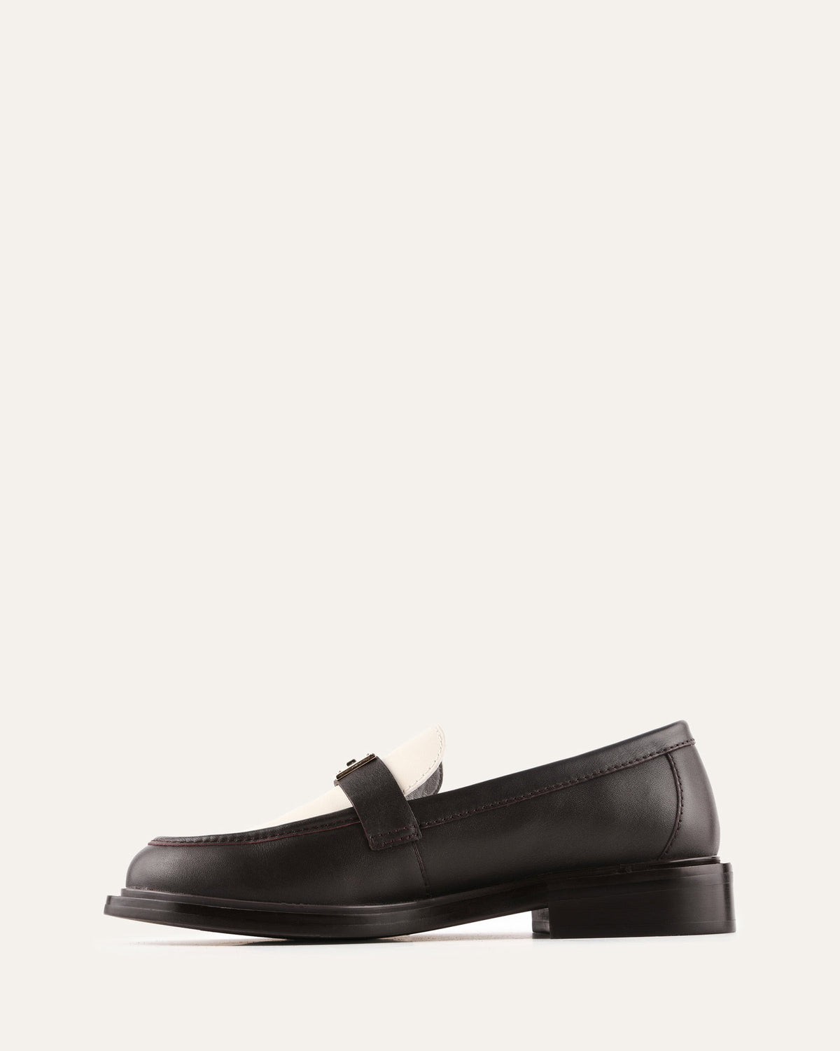 Black leather loafer shoe on a white background