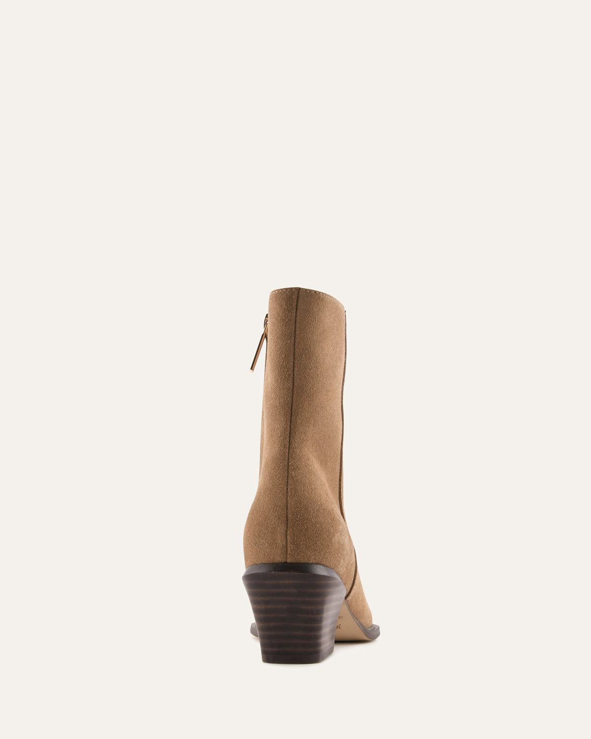 Tan ankle boot on a white background