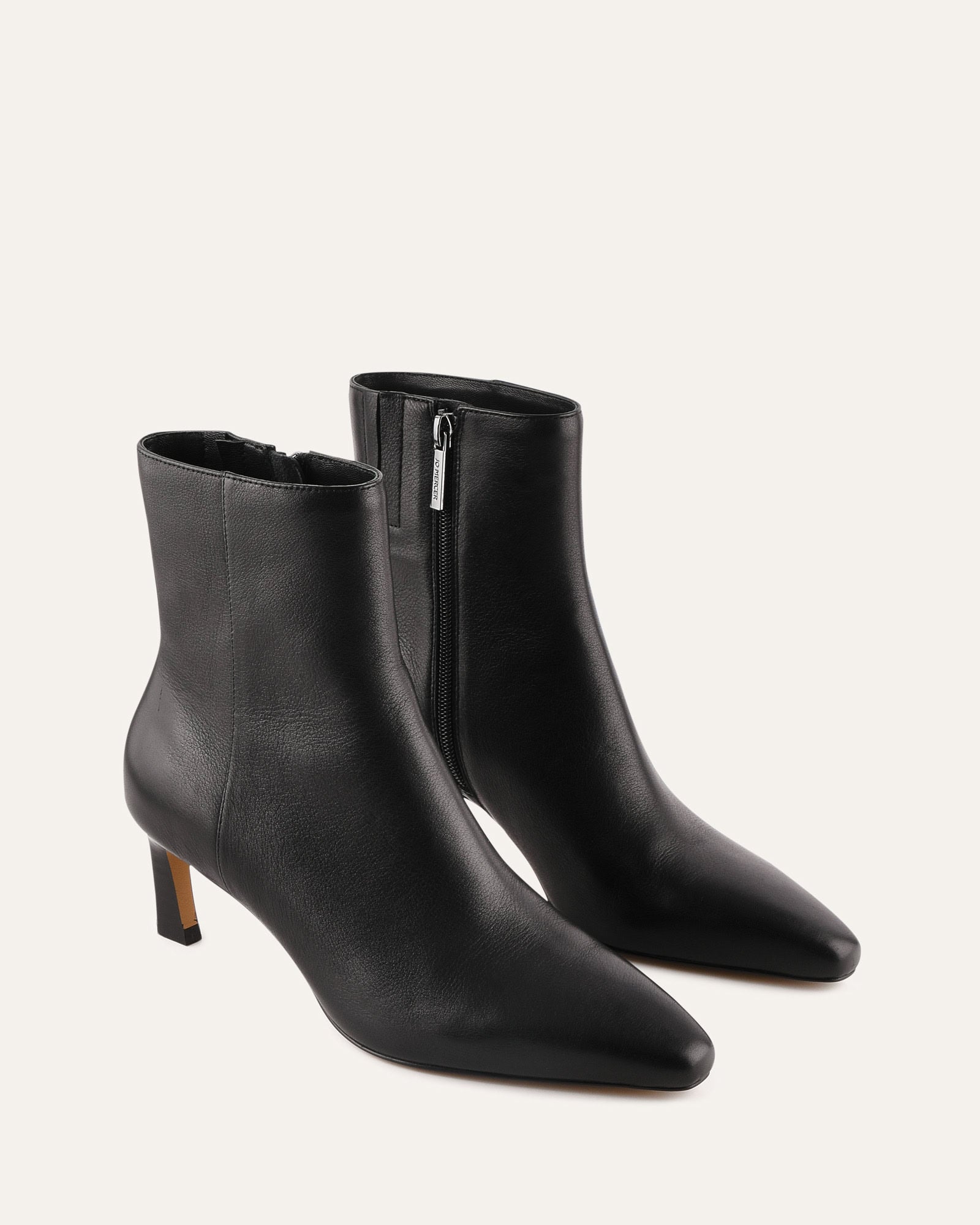 Black ankle boot on a white background