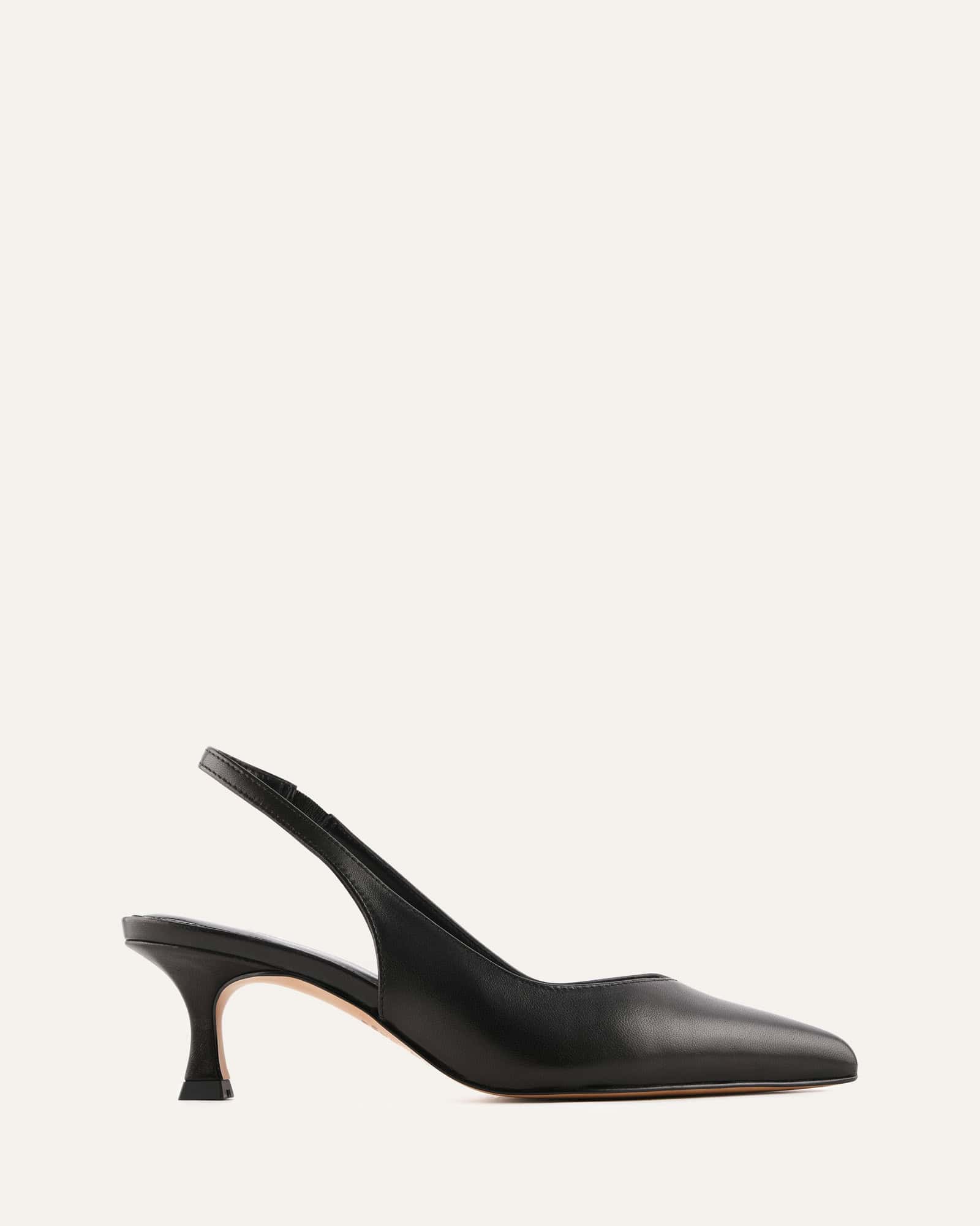 Black slingback shoe on a white background