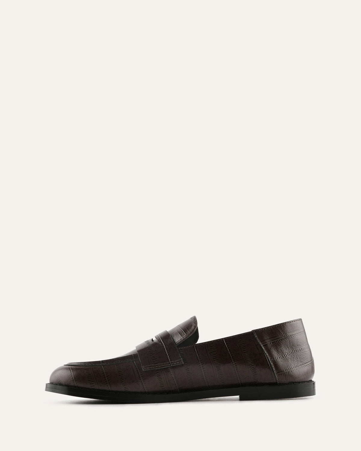 Brown leather loafer on a white background