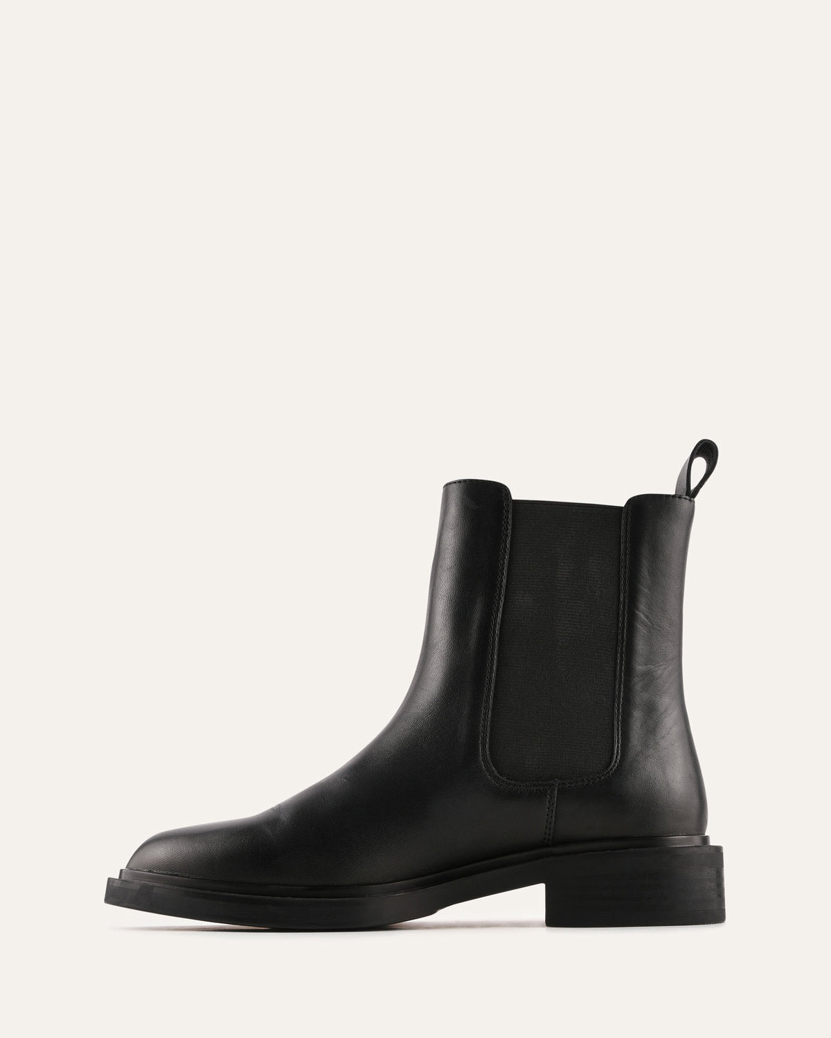 Black leather Chelsea boot on a white background