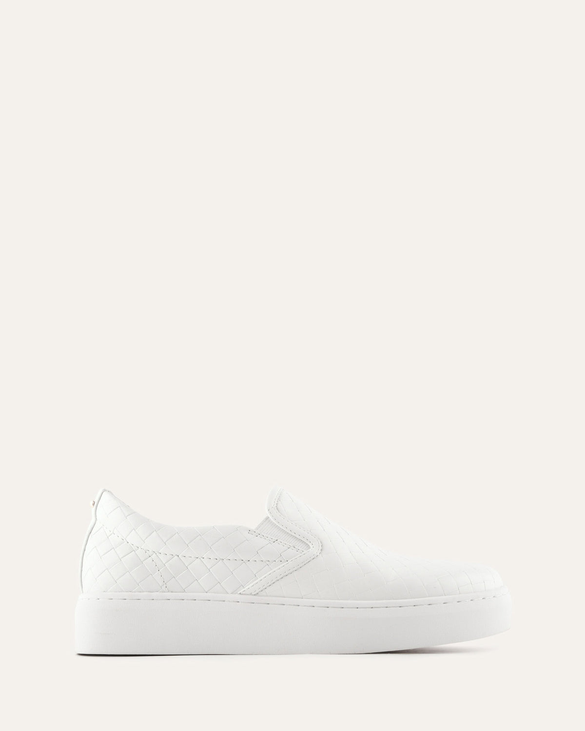White sneaker on a light gray background