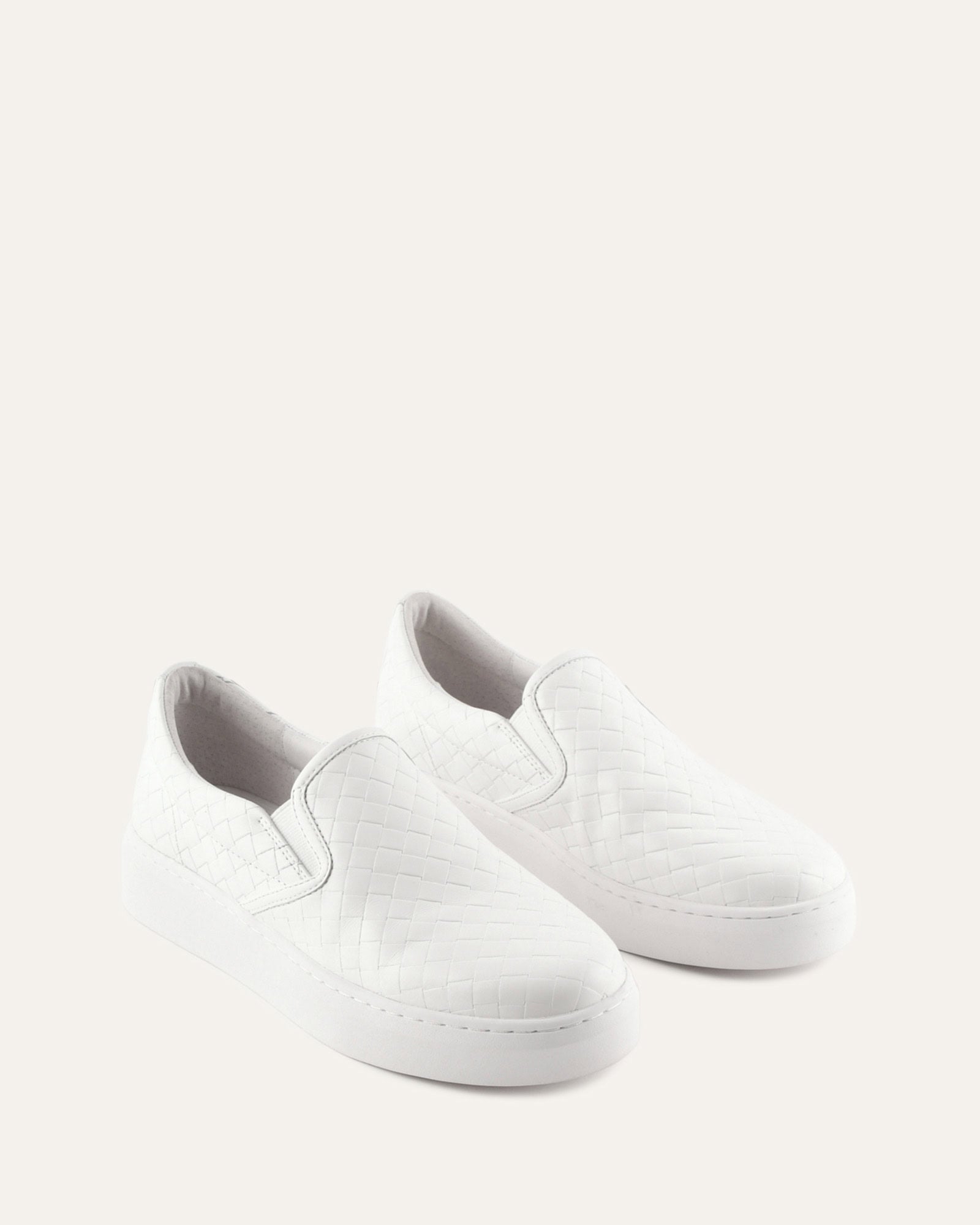 White sneaker on a light gray background