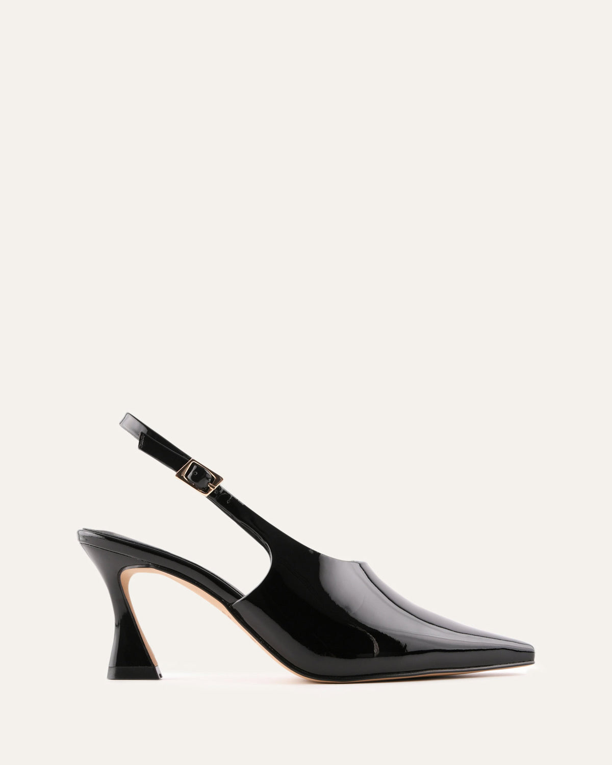 Black patent leather slingback shoe on a white background