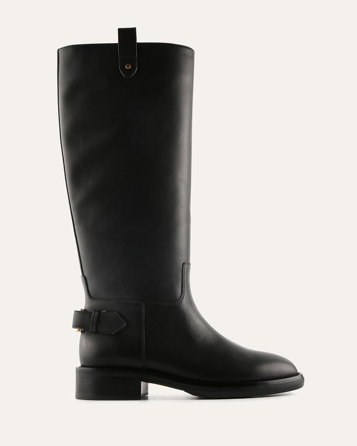Black knee-high boot with a buckle on a light gray background