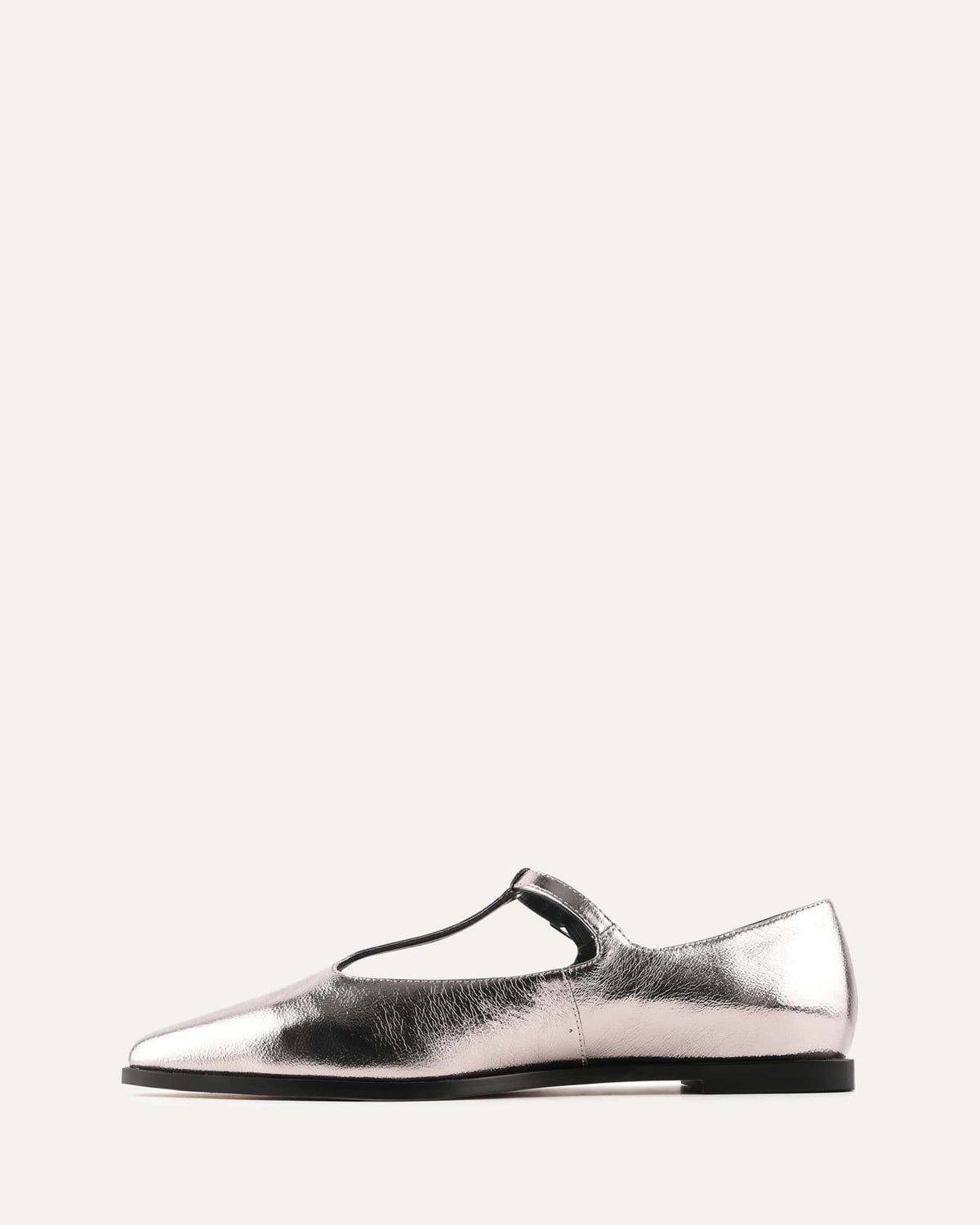 Silver slip-on shoe on a white background