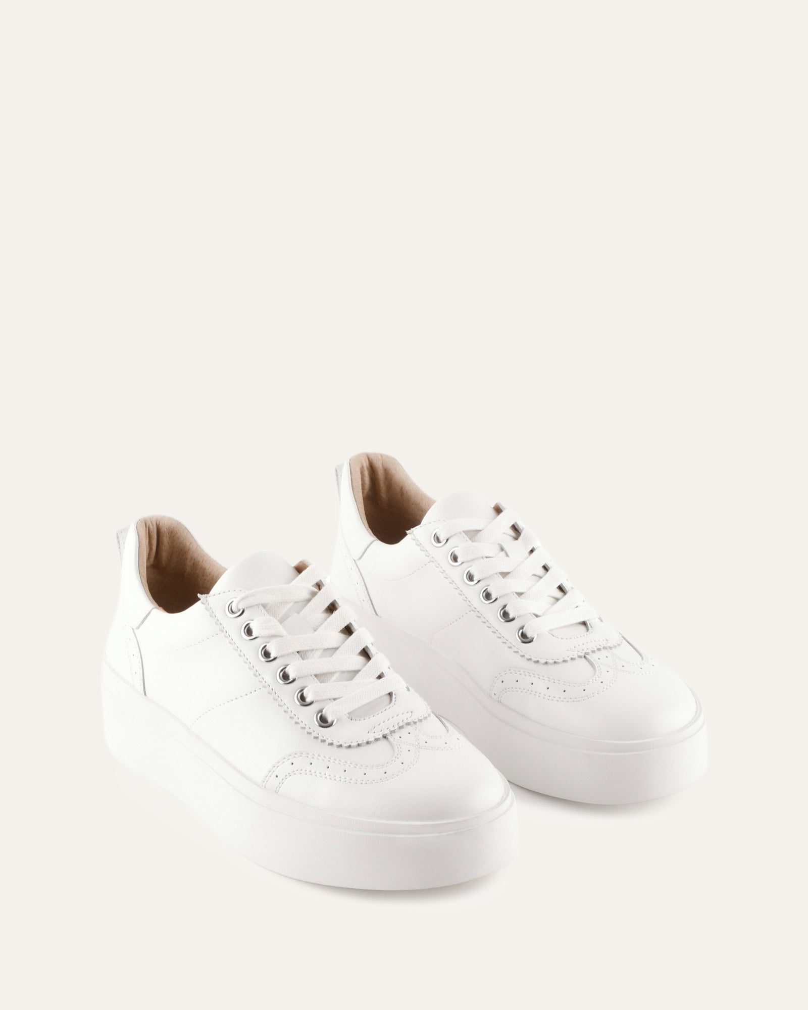 White sneaker on a light gray background