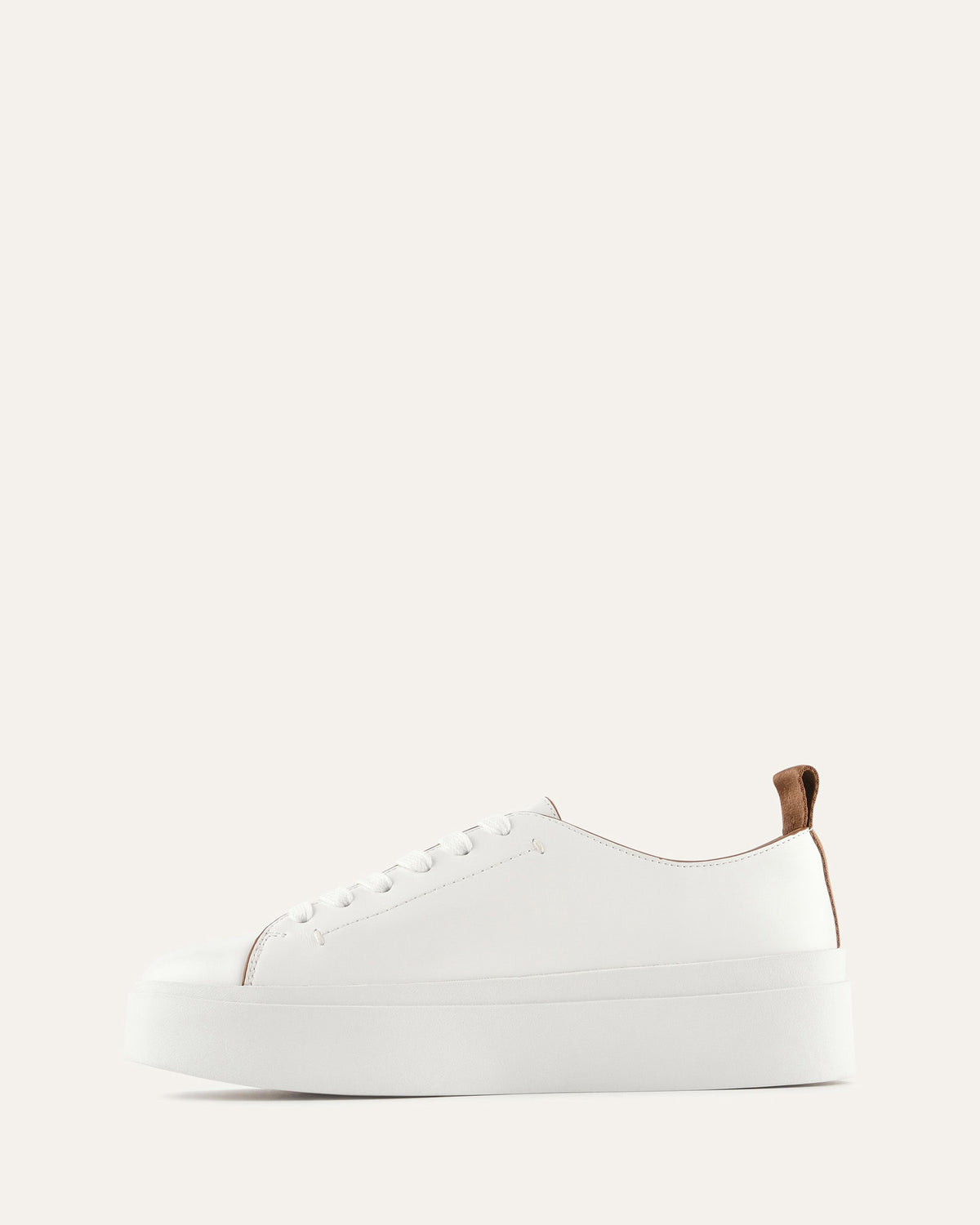 White sneaker with brown accents on a white background