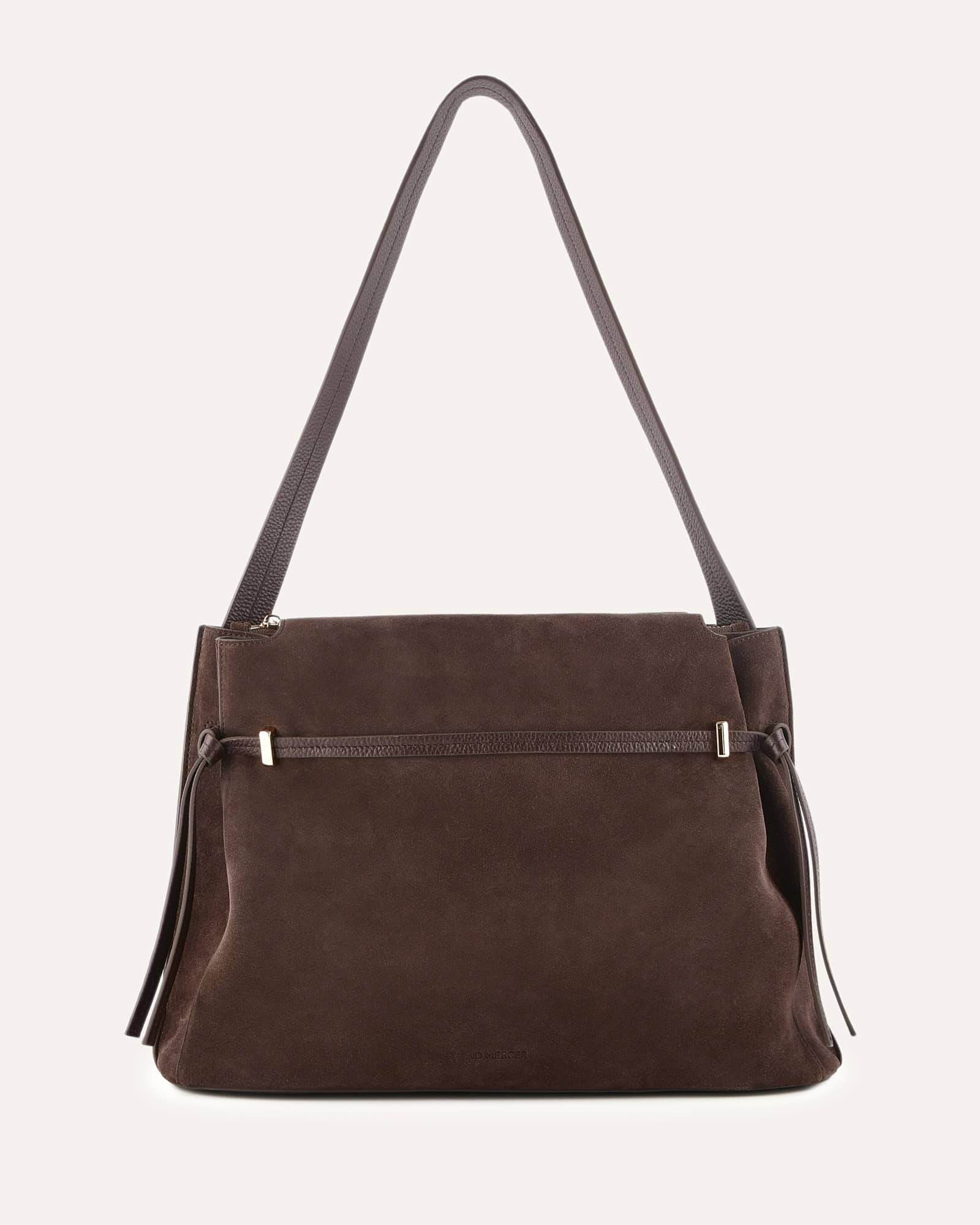 Brown handbag with a strap on a light gray background