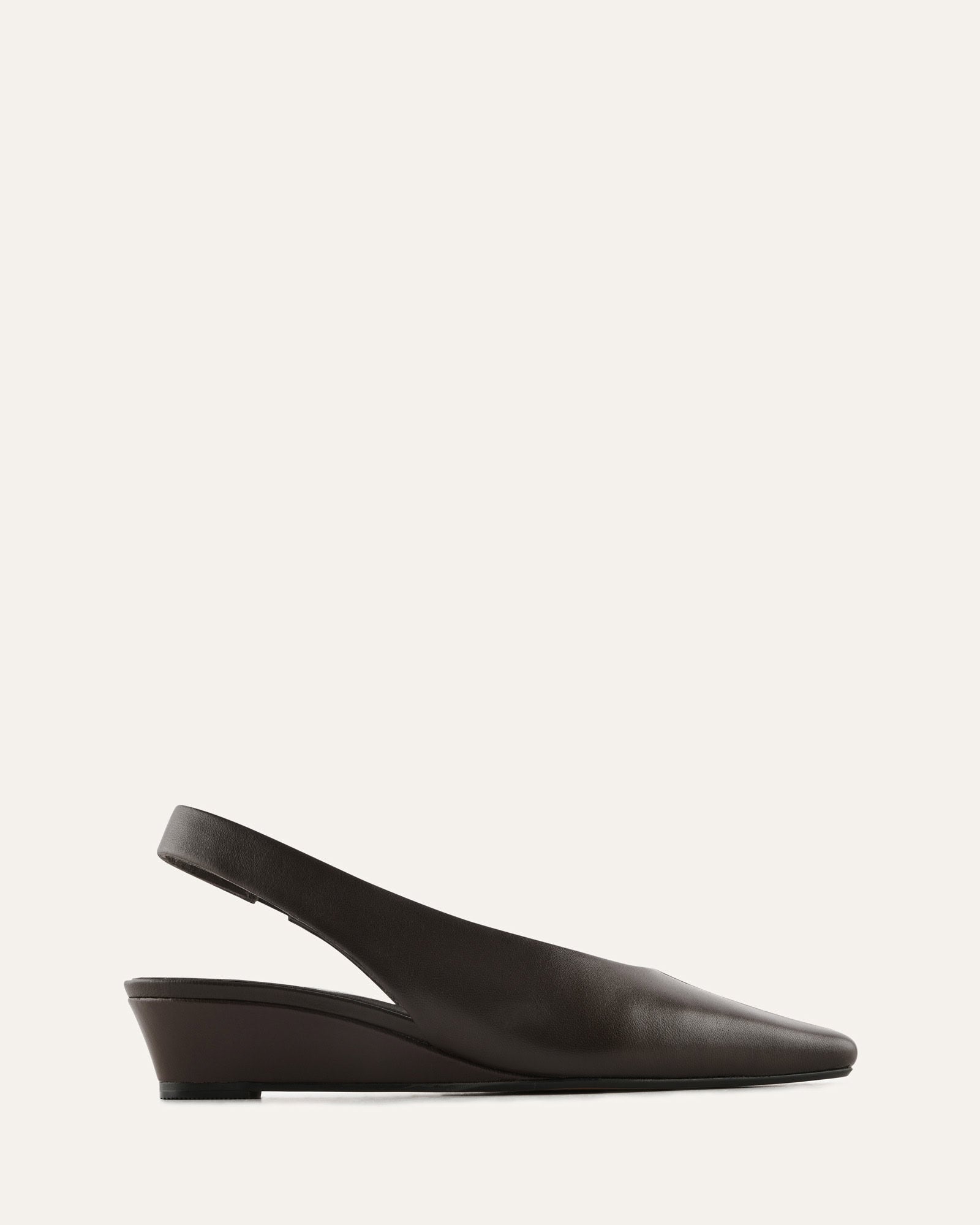 Black wedge sandal on a white background