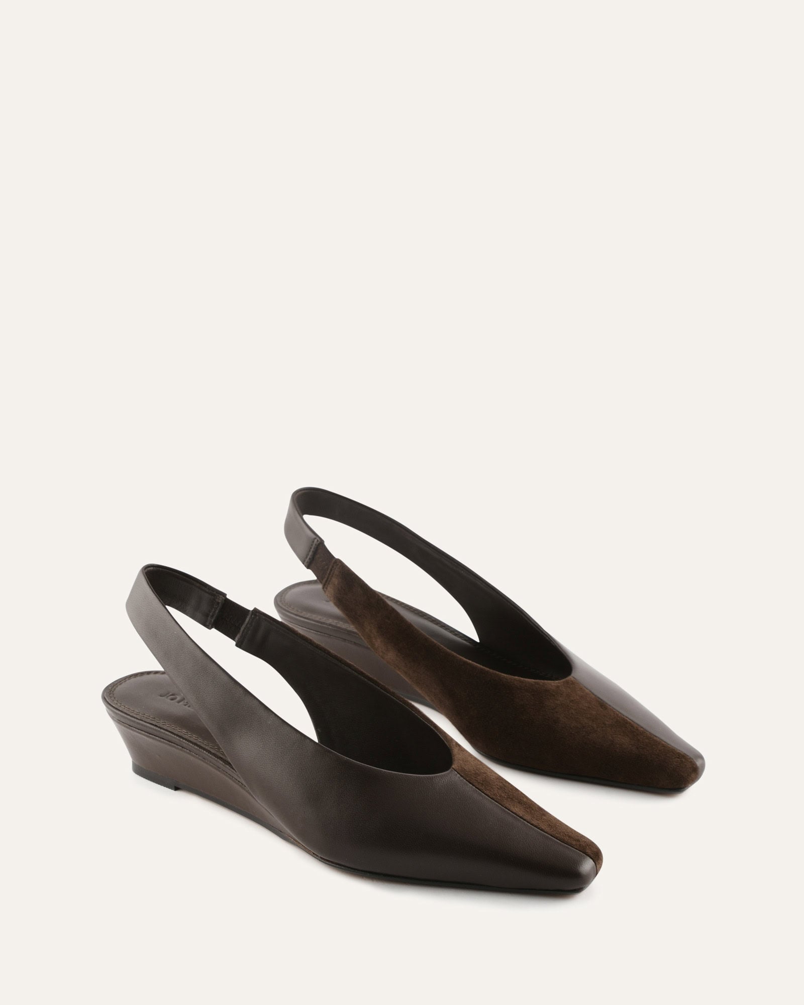 Black wedge sandal on a white background