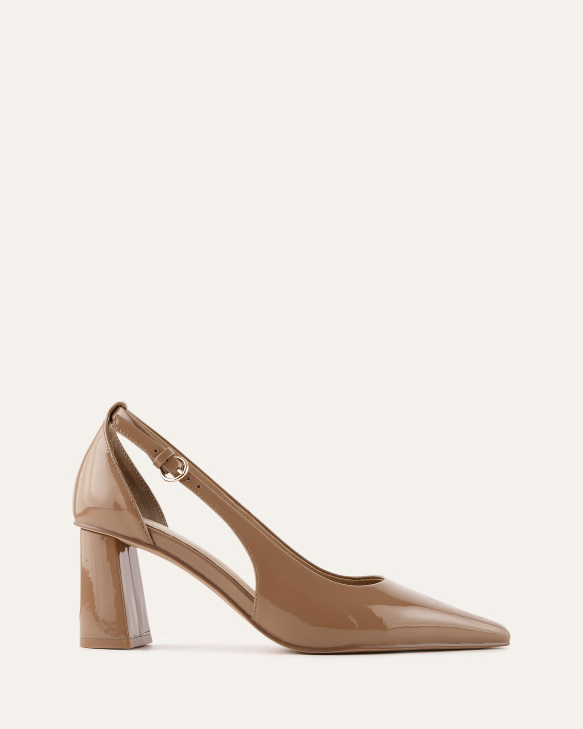 Beige high-heeled shoe on a light beige background