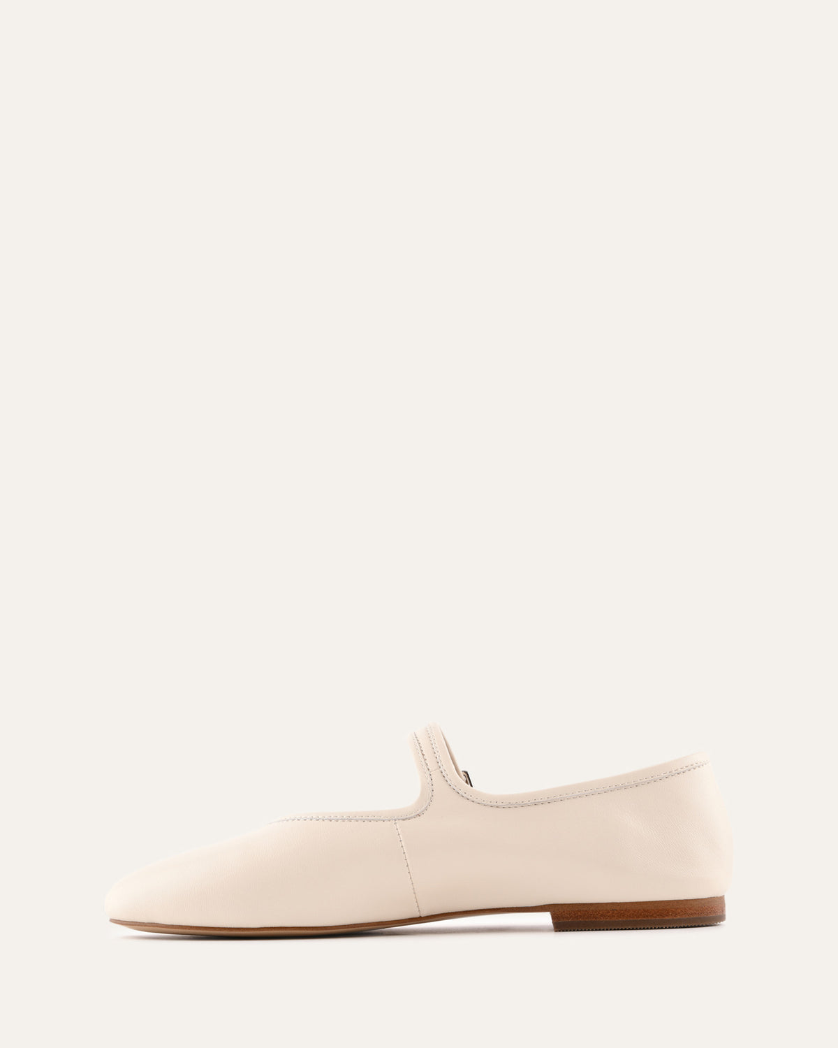 Beige loafer shoe on a white background