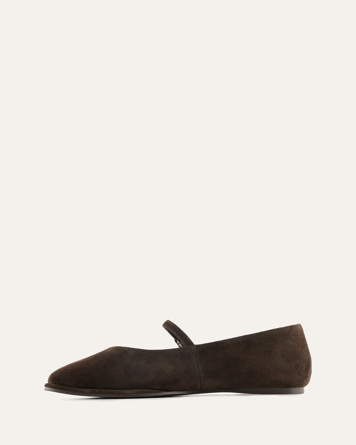 Brown flat shoe on a light gray background