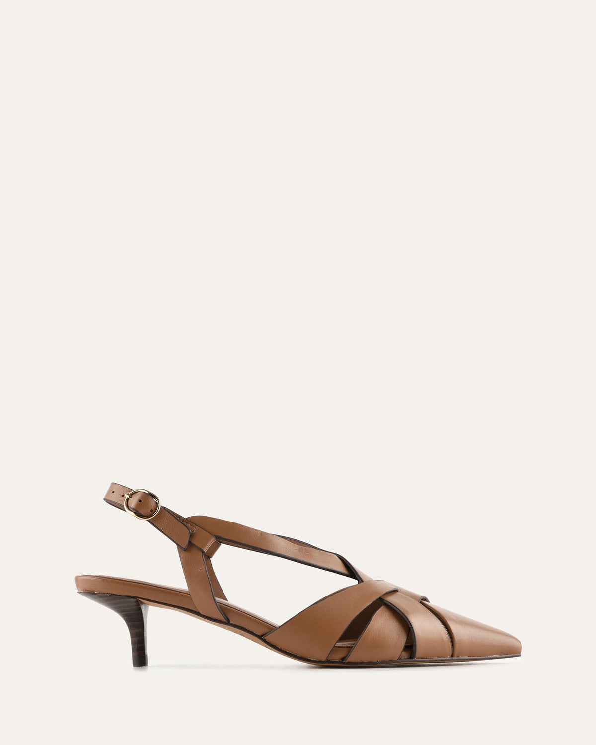 A single brown leather slingback sandal with a pointed toe, crisscrossing straps, and a low kitten heel, shown in profile against a solid off-white background.