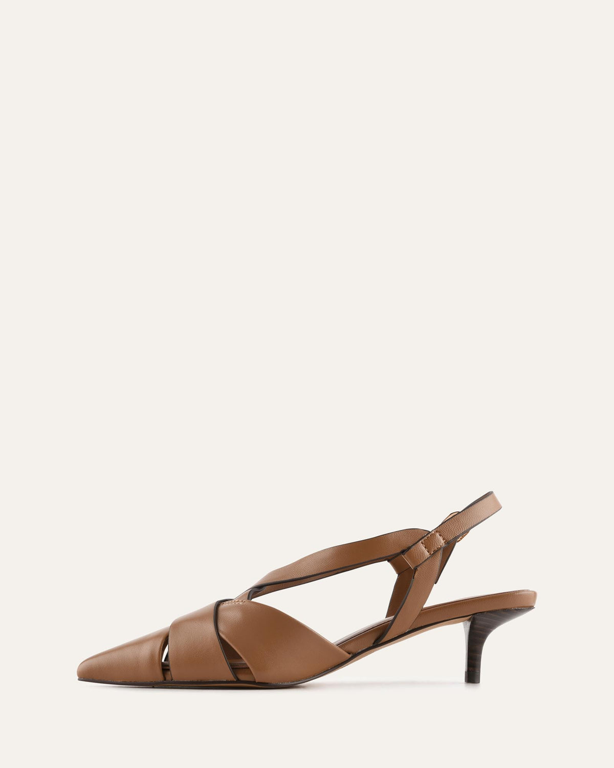 A single brown leather slingback sandal with a pointed toe and a low kitten heel, shown in profile against a solid off-white background.