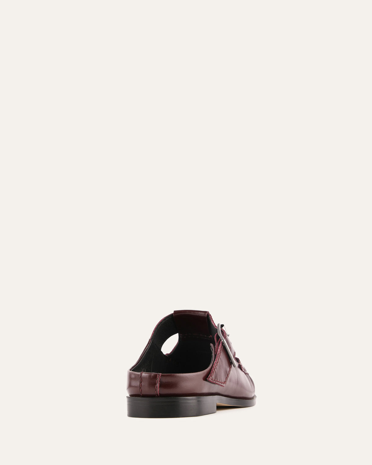 Brown leather shoe on a white background