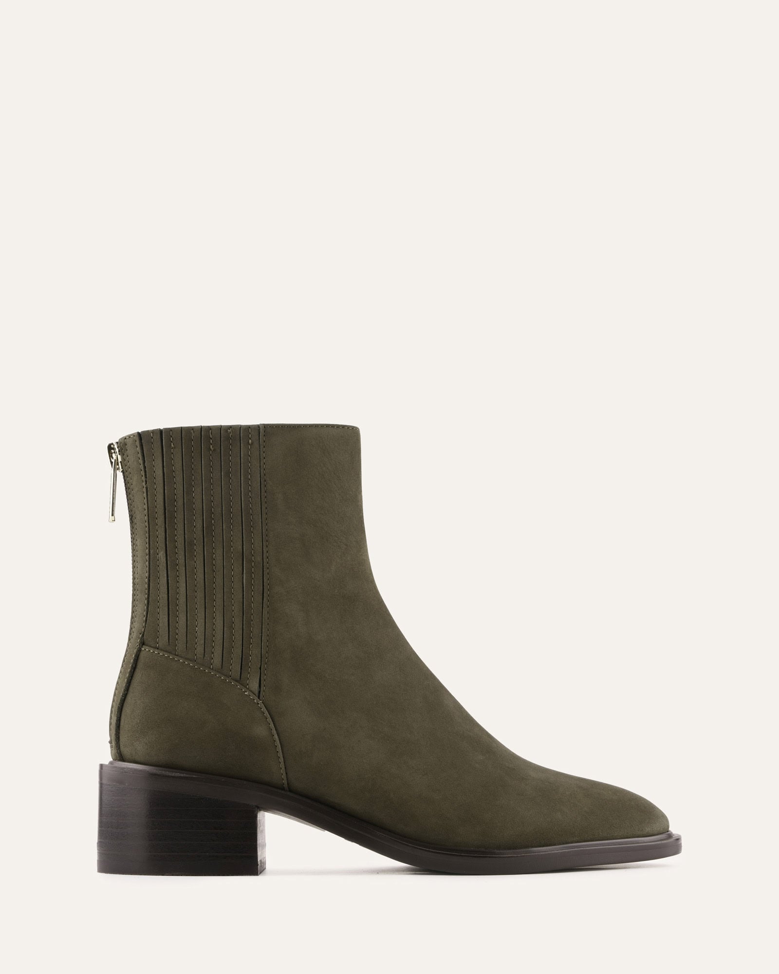 Green ankle boot on a white background