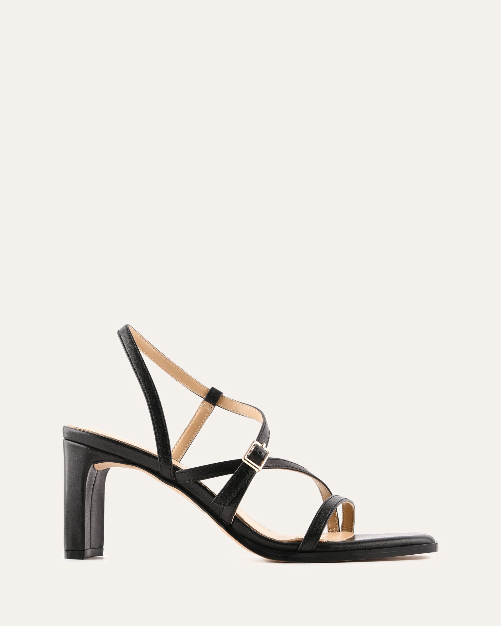 Black strappy sandal on a white background