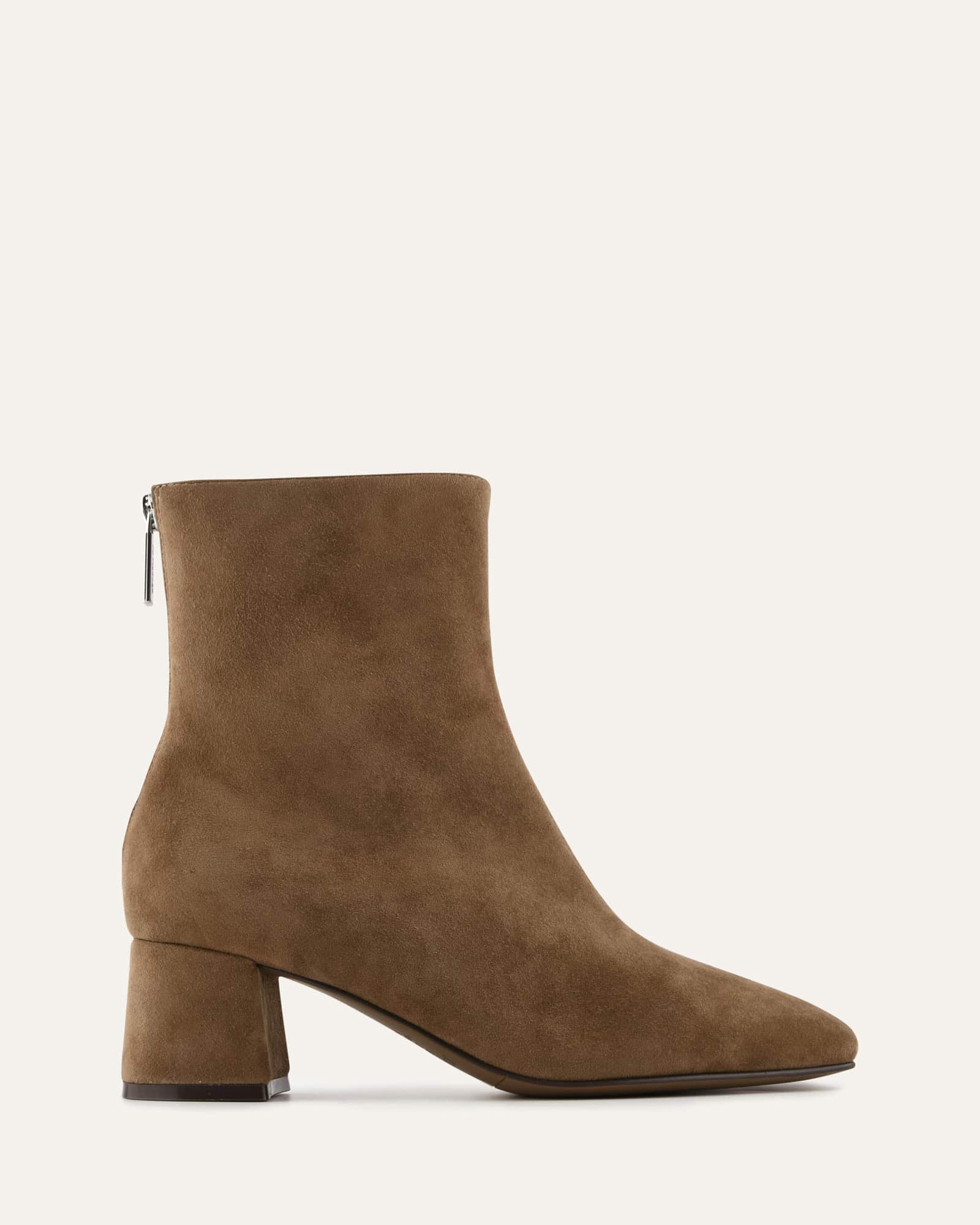 Brown suede ankle boot on a white background