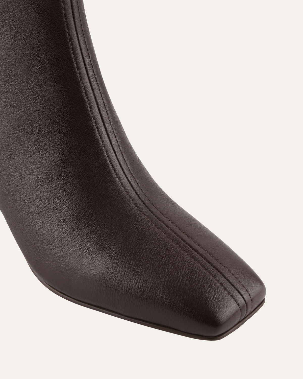 Brown leather armrest on a white background