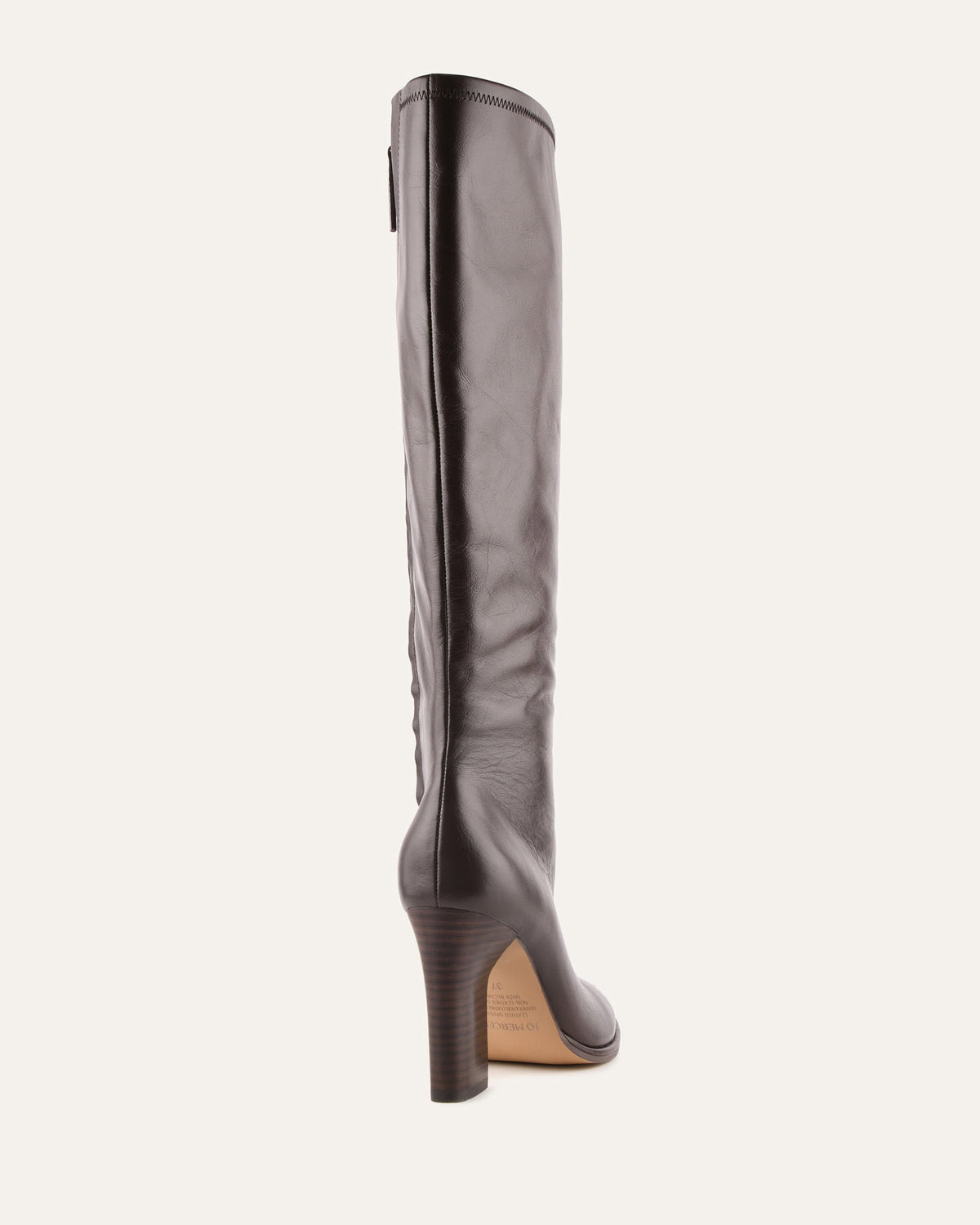 Gray knee-high boot on a white background