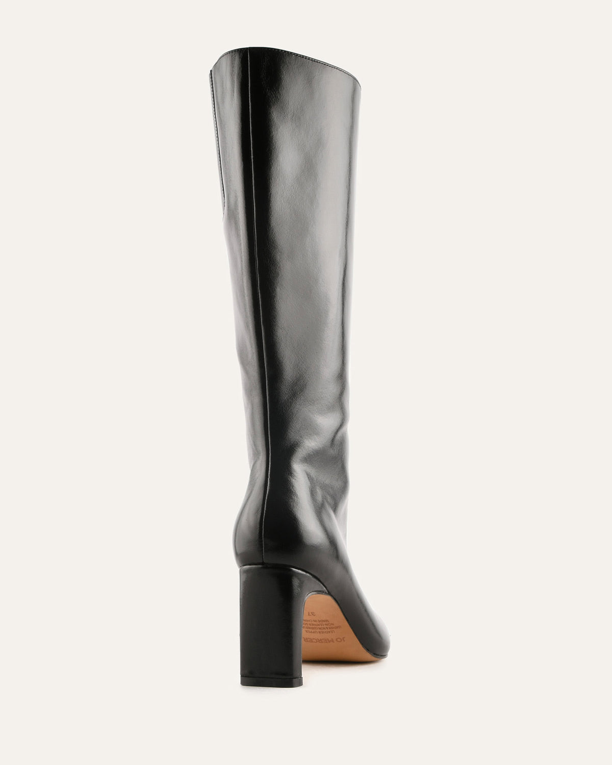 Black knee-high boot on a white background