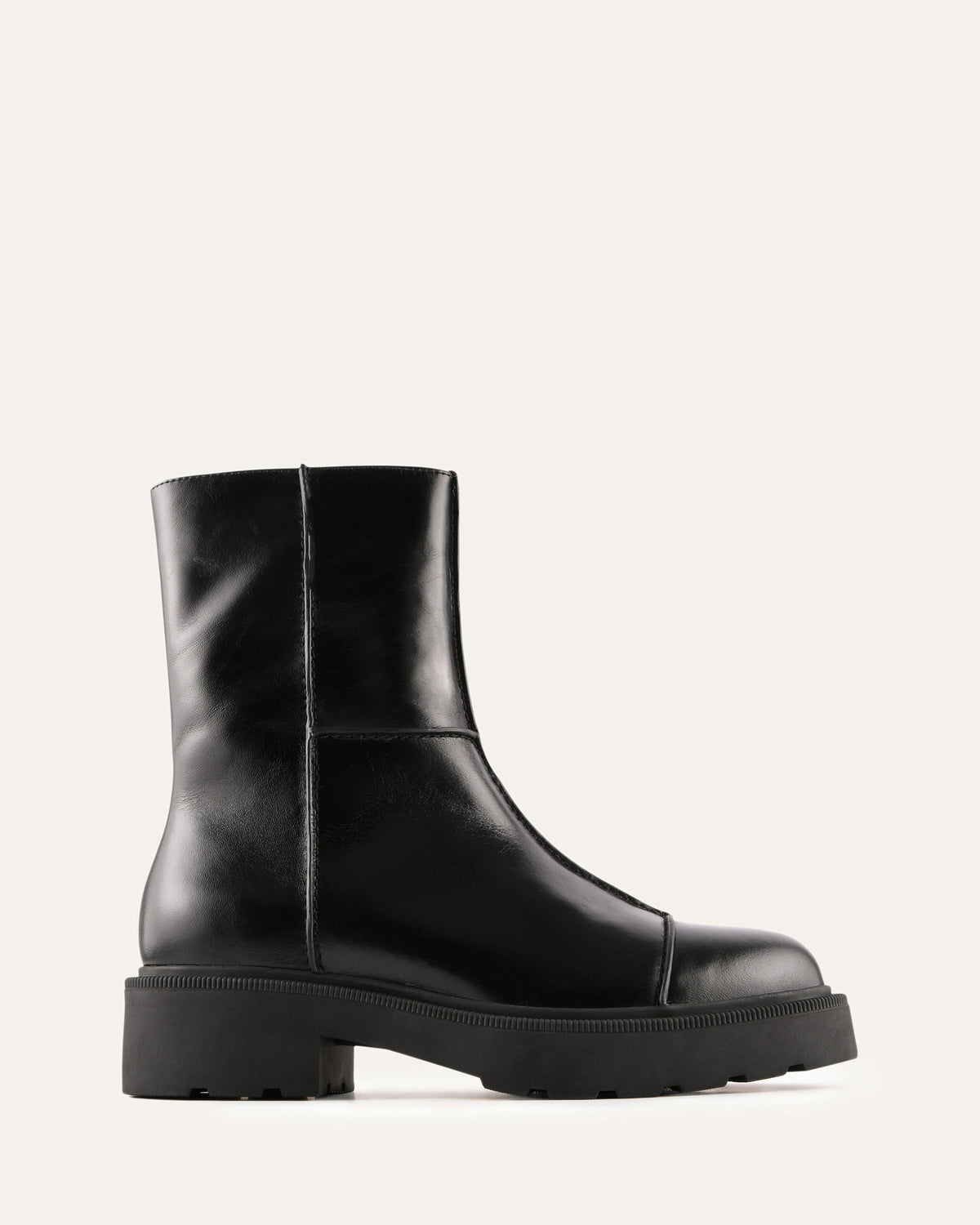 Black leather ankle boots on a white background