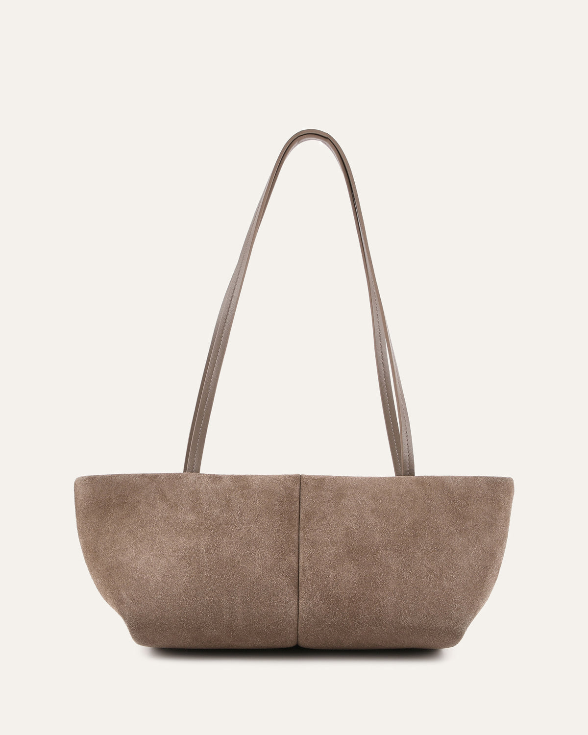 Brown suede handbag with a strap on a light beige background