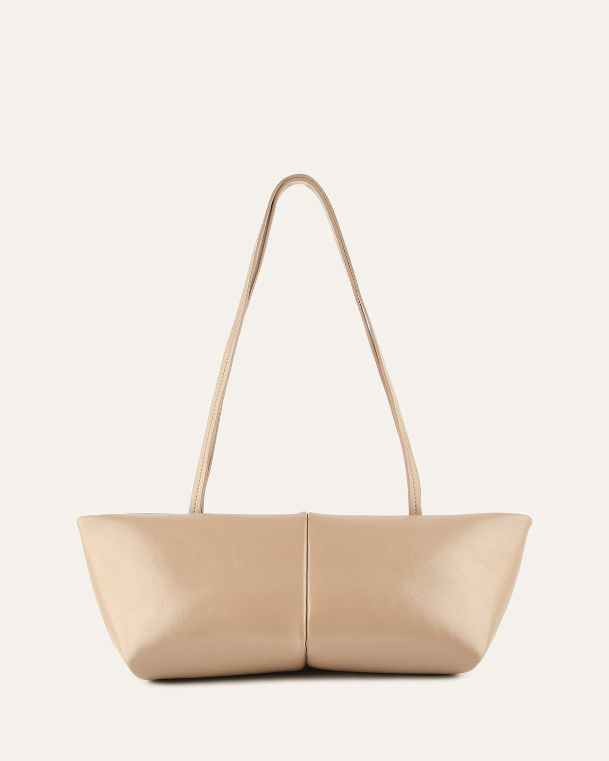 Beige handbag with a strap on a light beige background
