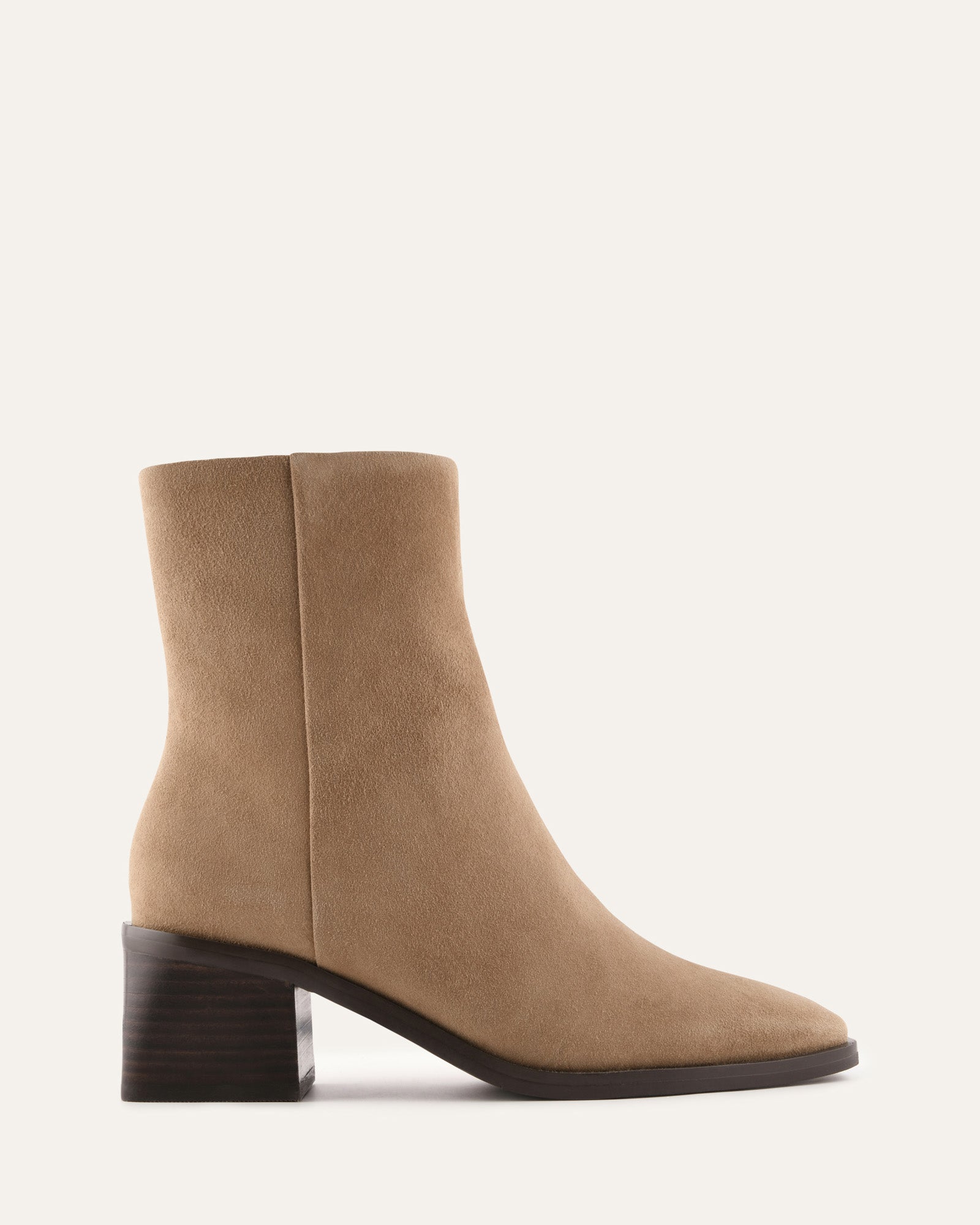Tan ankle boot on a white background