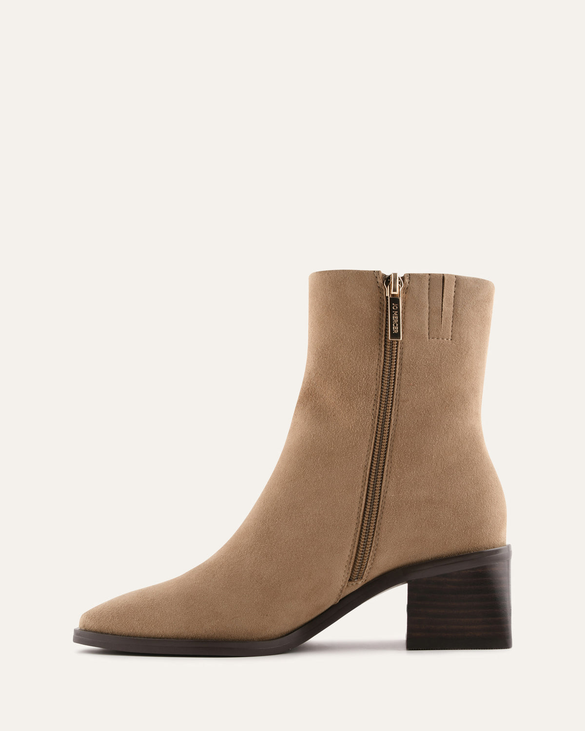 Tan ankle boot with a zipper on a white background