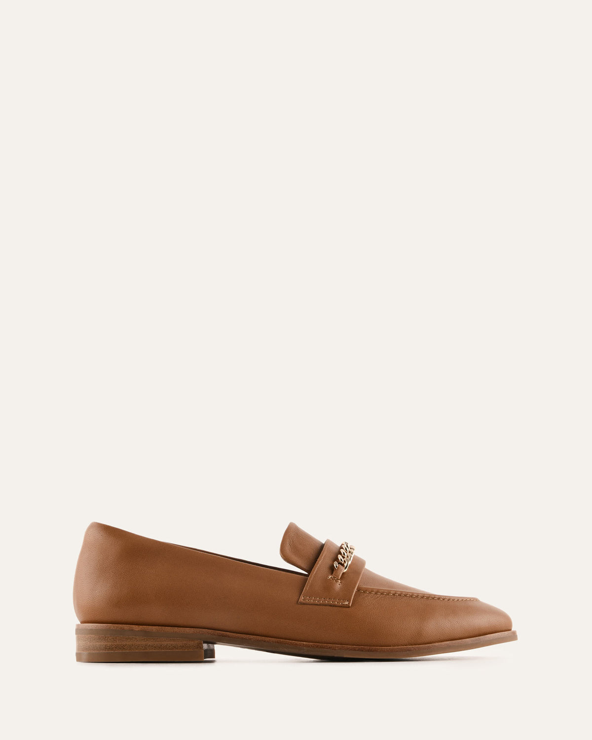 Tan loafer shoe on a white background