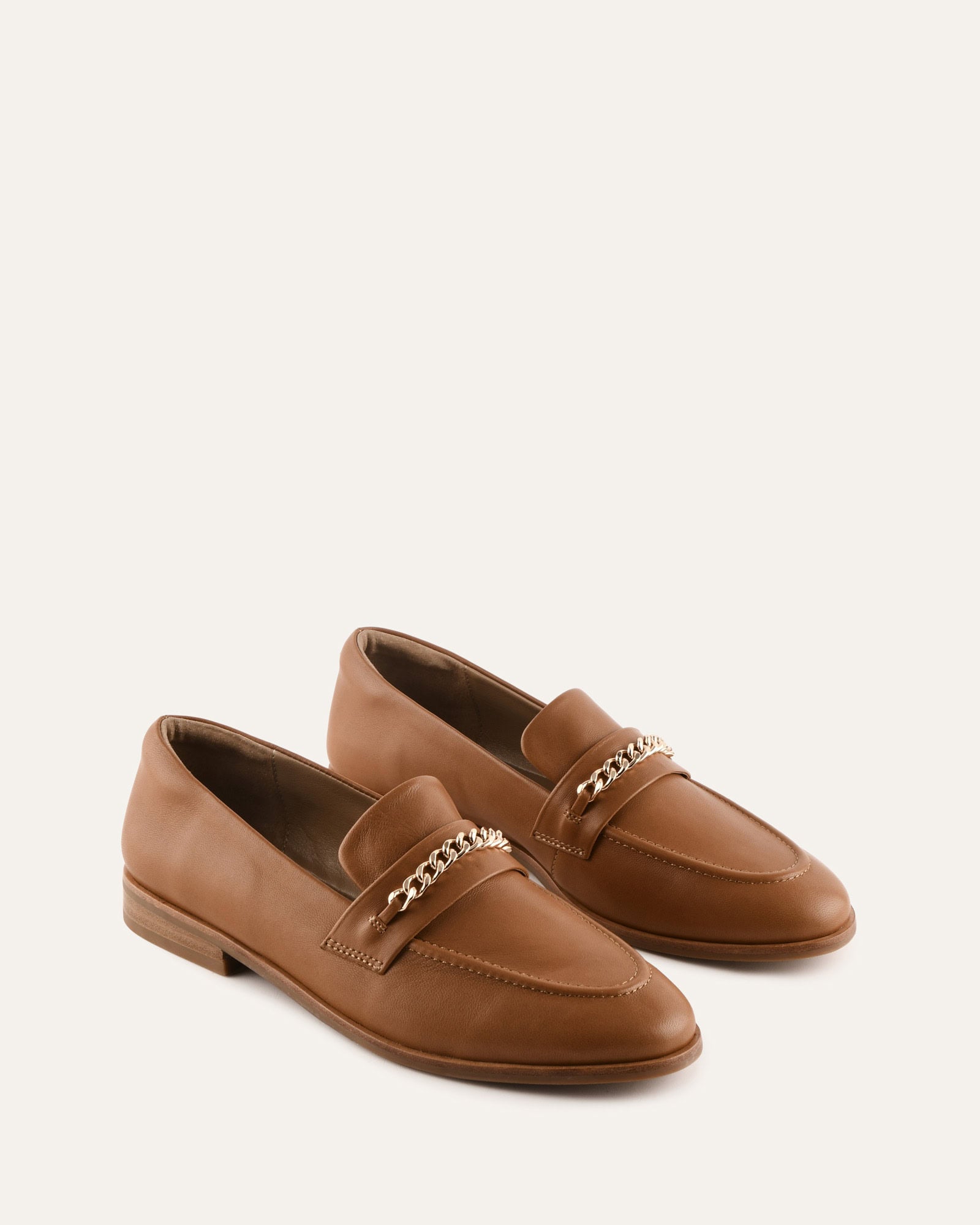 Tan loafer shoe on a white background