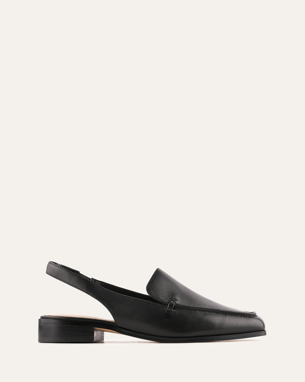 Black loafer shoe on a white background