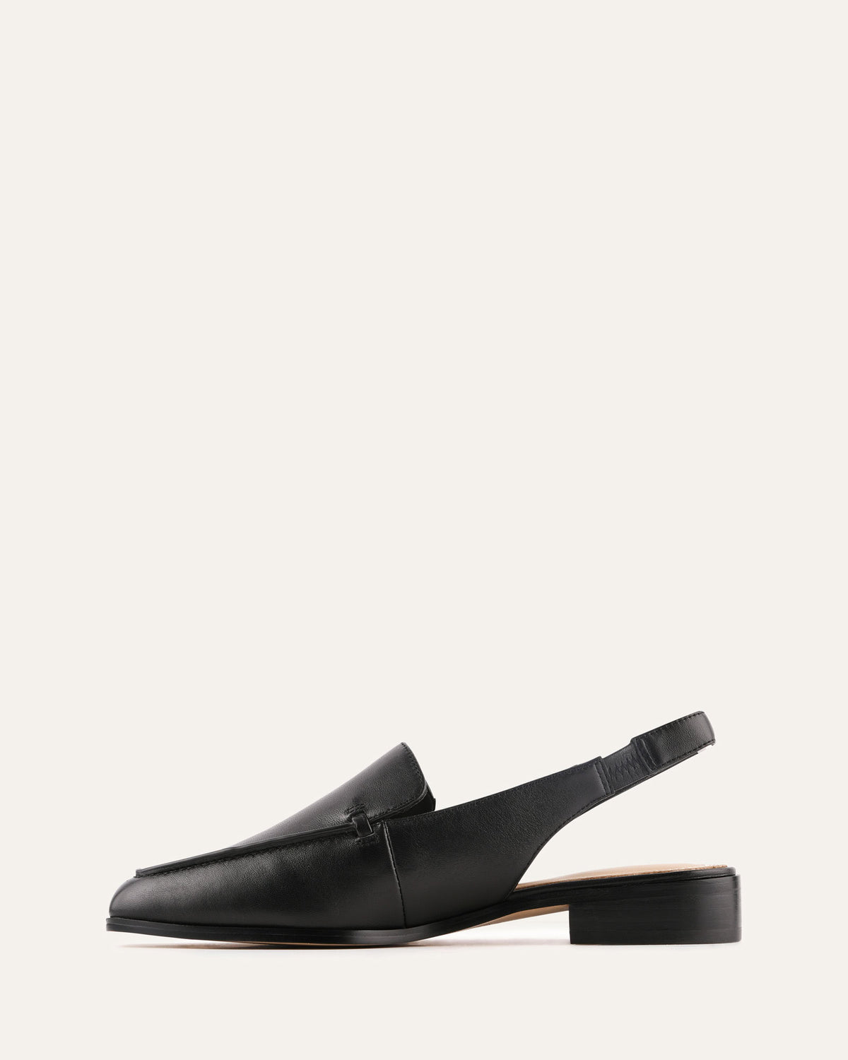 Black loafer shoe on a white background