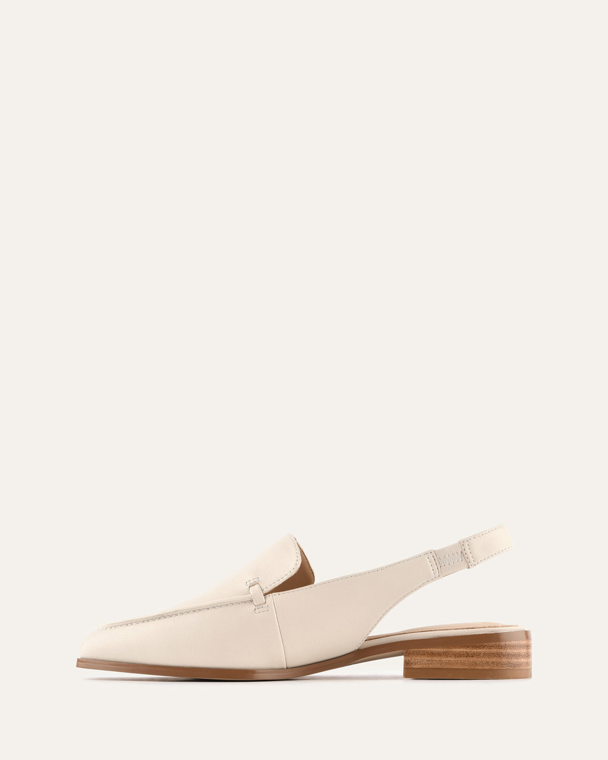 Beige loafer shoe on a white background