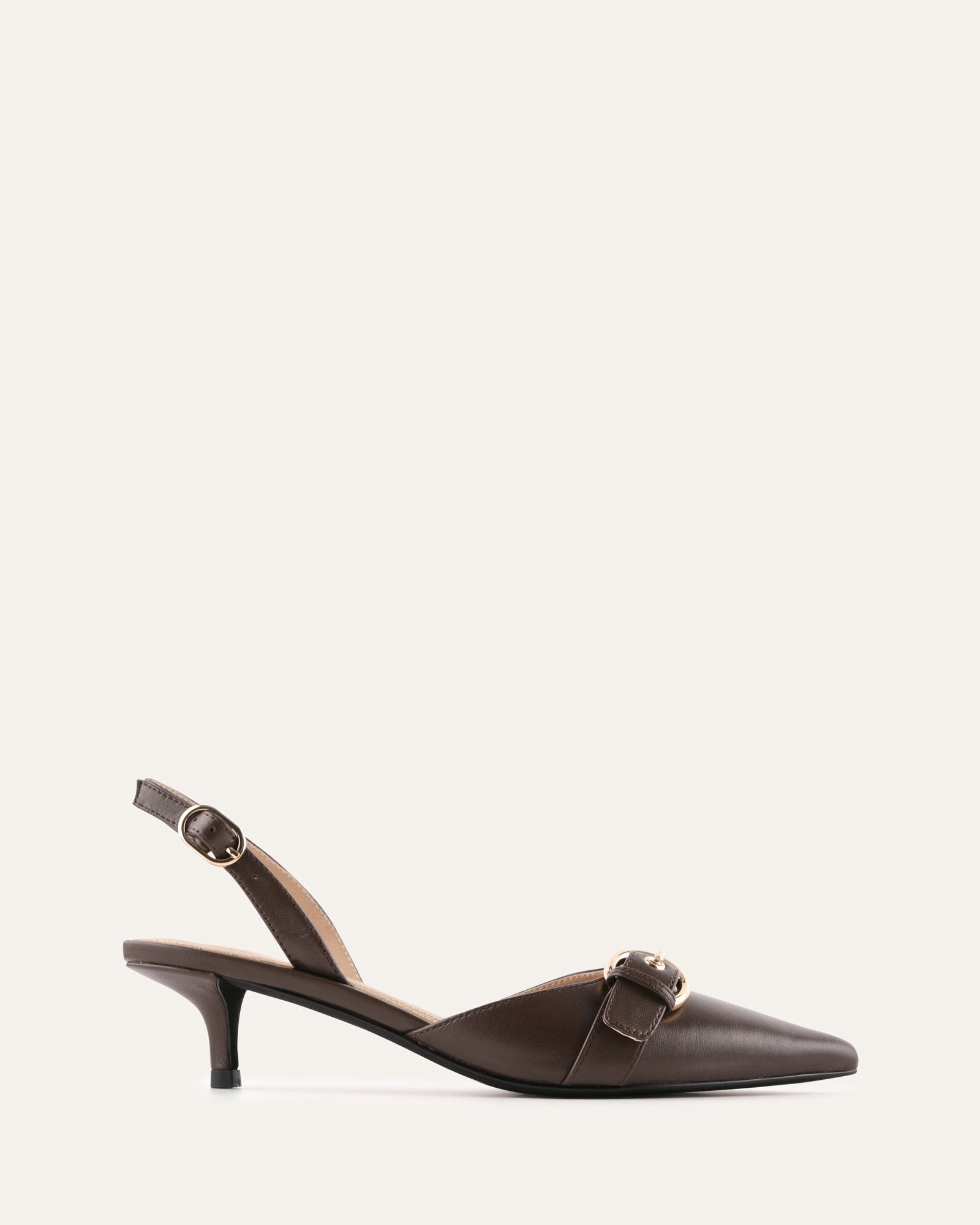Brown slingback shoe with a buckle on a white background