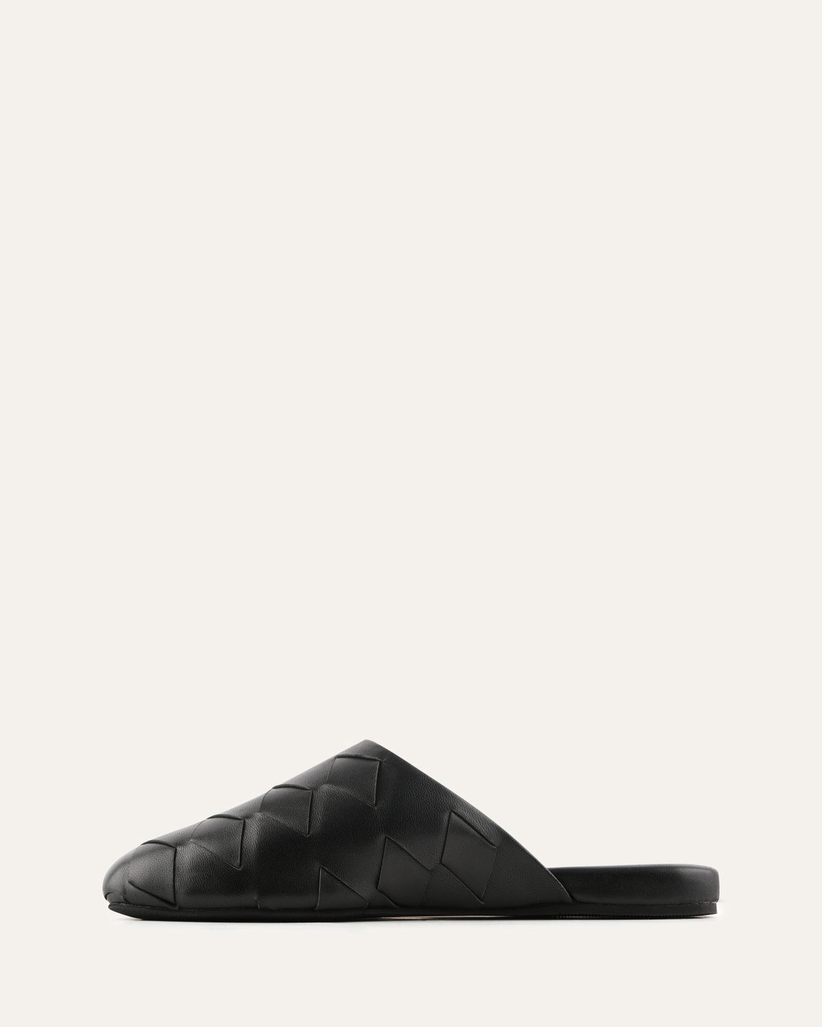 Black woven slide sandal on a white background