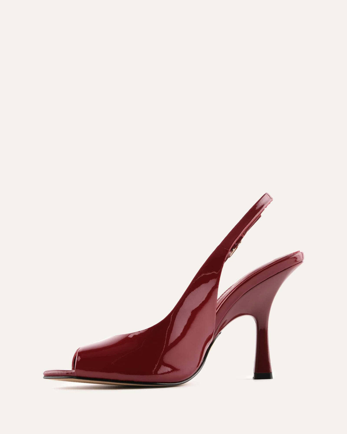 Red high-heeled shoe on a white background